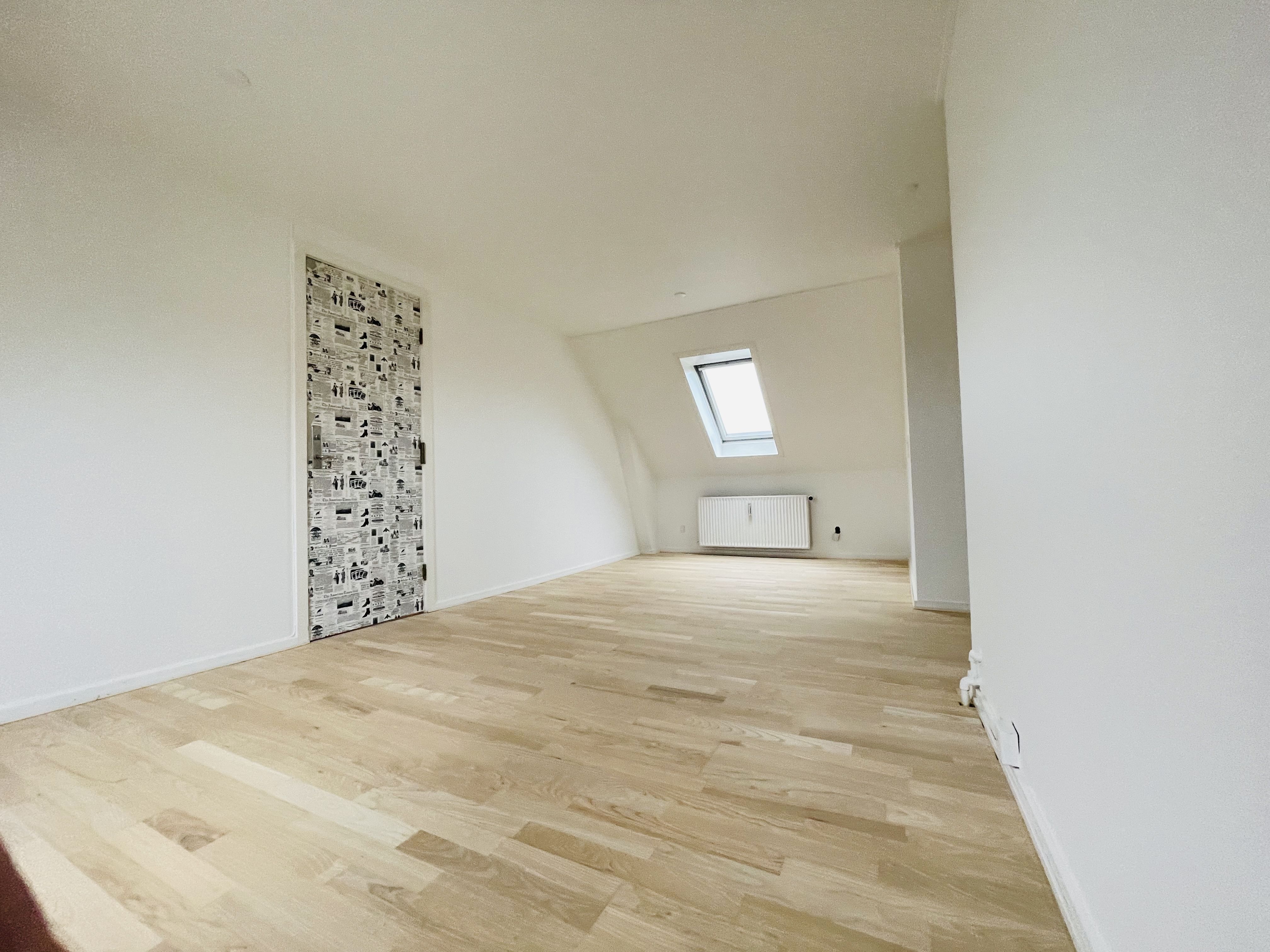 Penthouse i Torvegade med udsigt til havnen