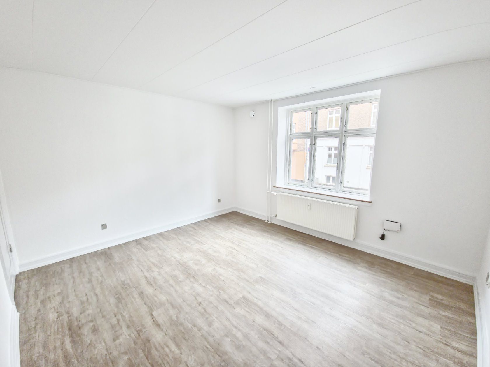 God 2 værelses i centrum med parkering