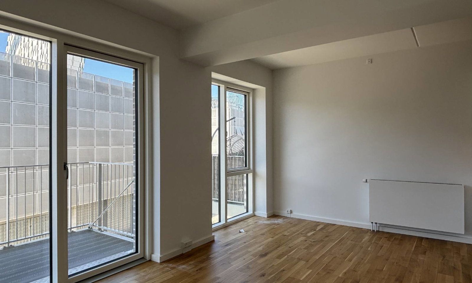 Lys 3-værelses lejlighed på 70 m² med vestvendt altan i Bellakvarteret