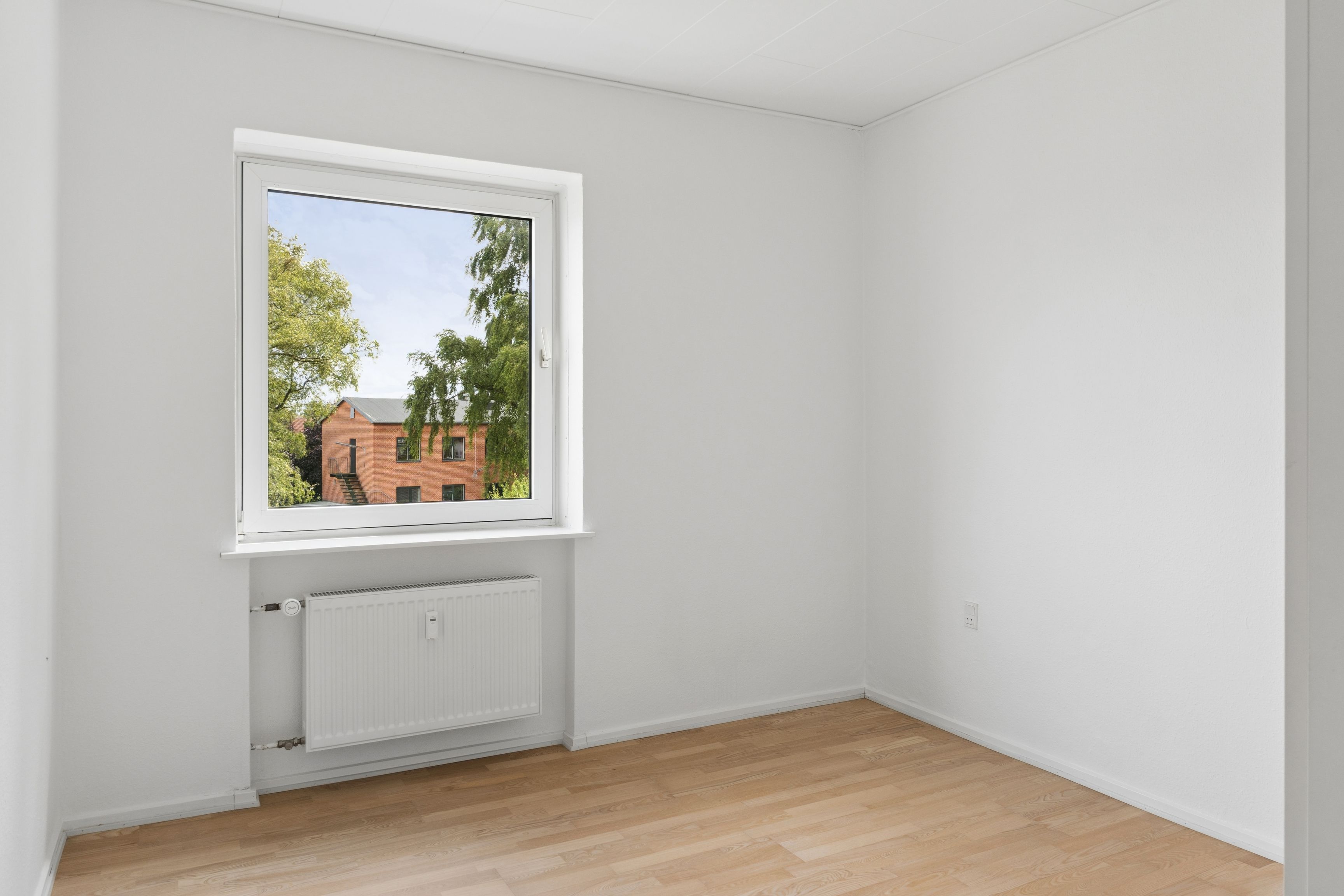 Nyrenoveret 3-værelses lejlighed med privat altan på øverste etage
