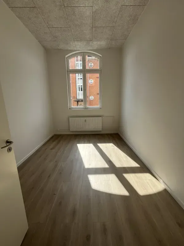 Skøn 3-værelses lejlighed med havkig centralt i Gråsten med eget kælderrum