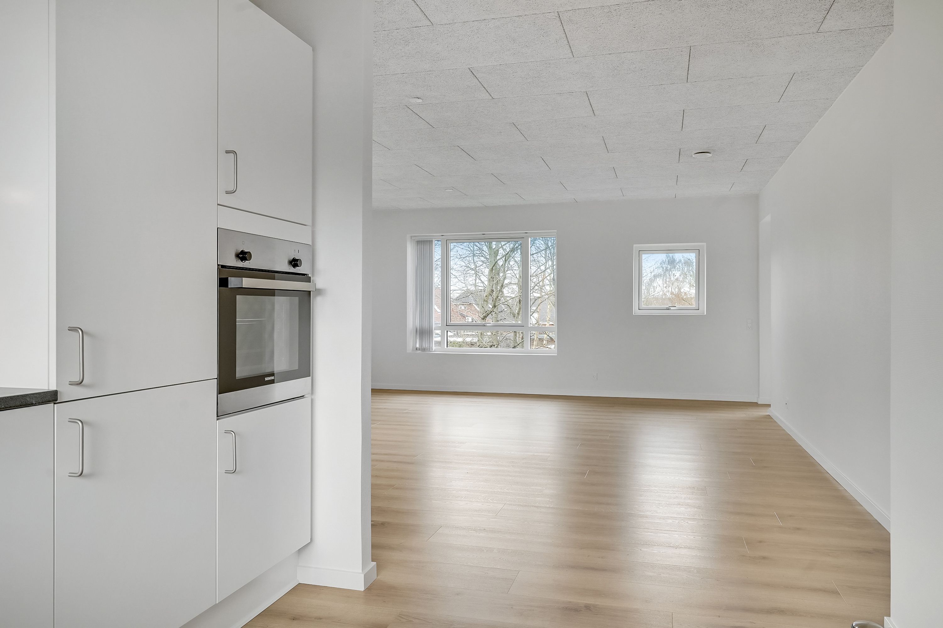 Lys og veldisponeret 3-værelses lejlighed på 96 m² med altan