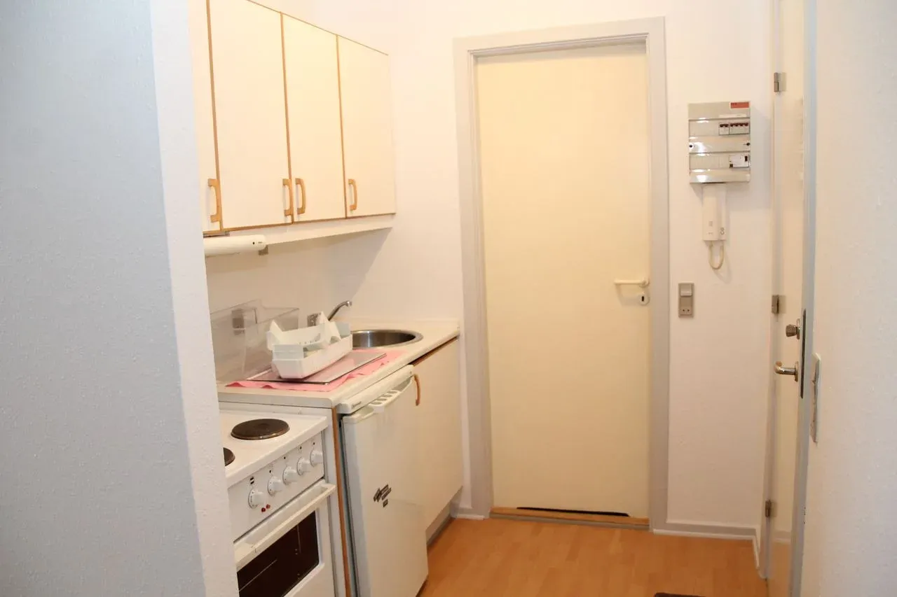 Fin 2-værelses med fælles tagterrasse og elevator