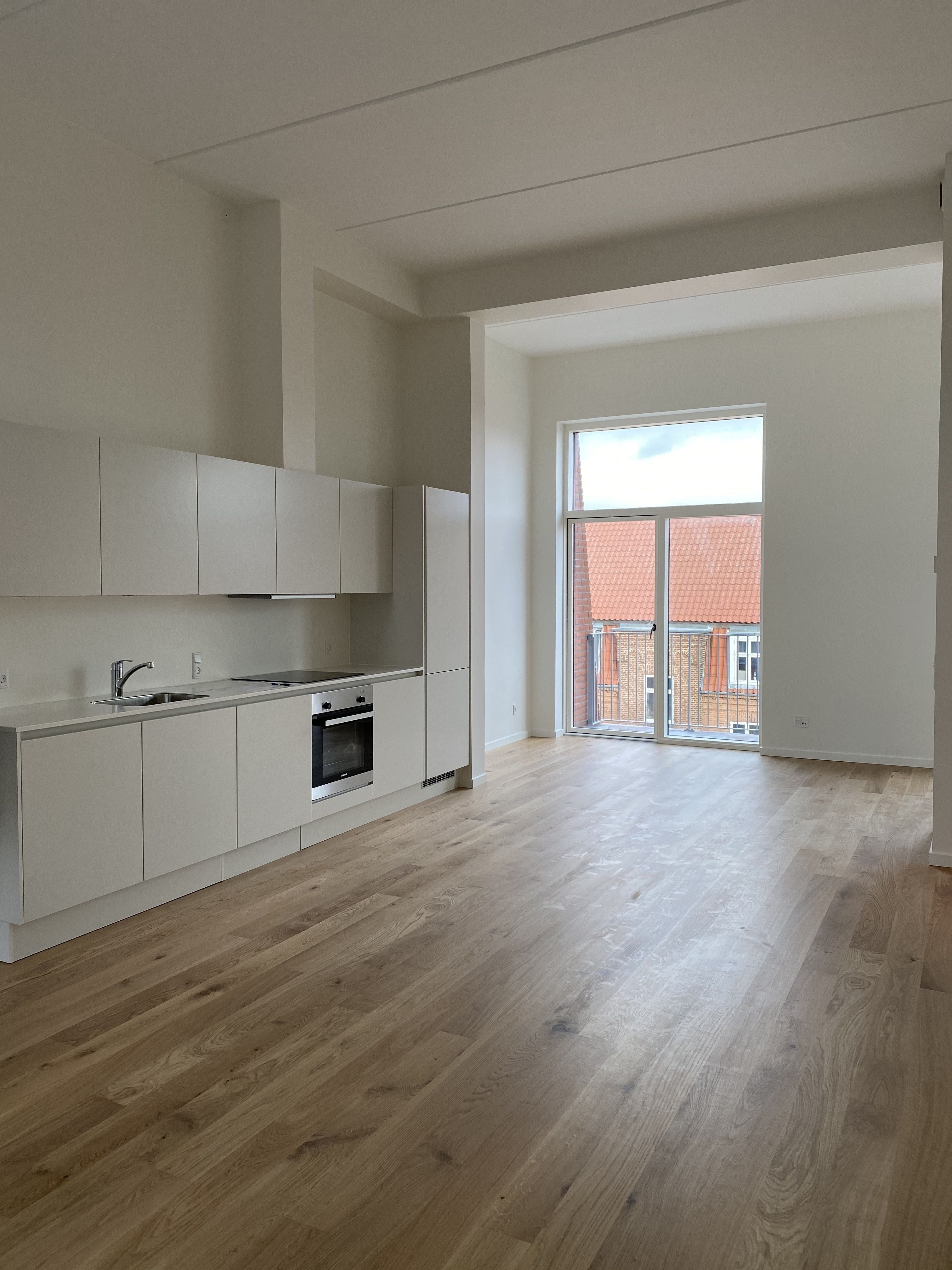 Penthouse lejlighed med 3,6 m til loft og altan