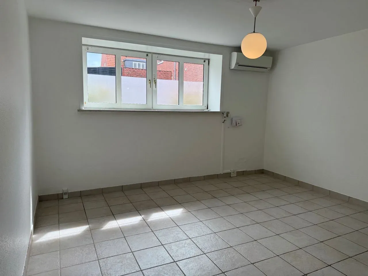 Fin kælderlejlighed på 60 m²