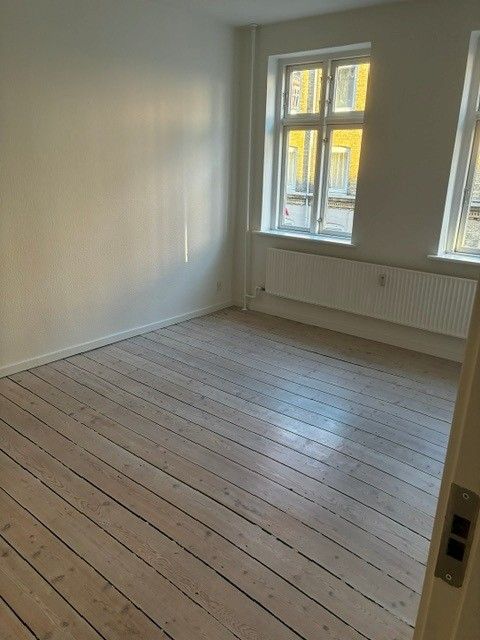 Lys og indbydende 70 m² lejlighed med udsigt til grønt gårdmiljø