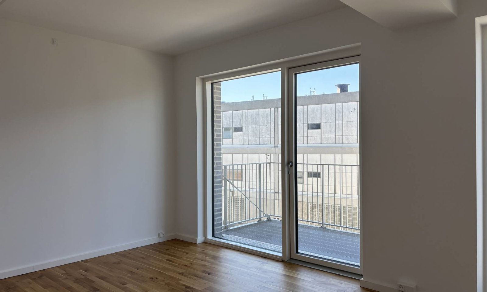 Lys 3-værelses lejlighed på 70 m² med vestvendt altan i Bellakvarteret