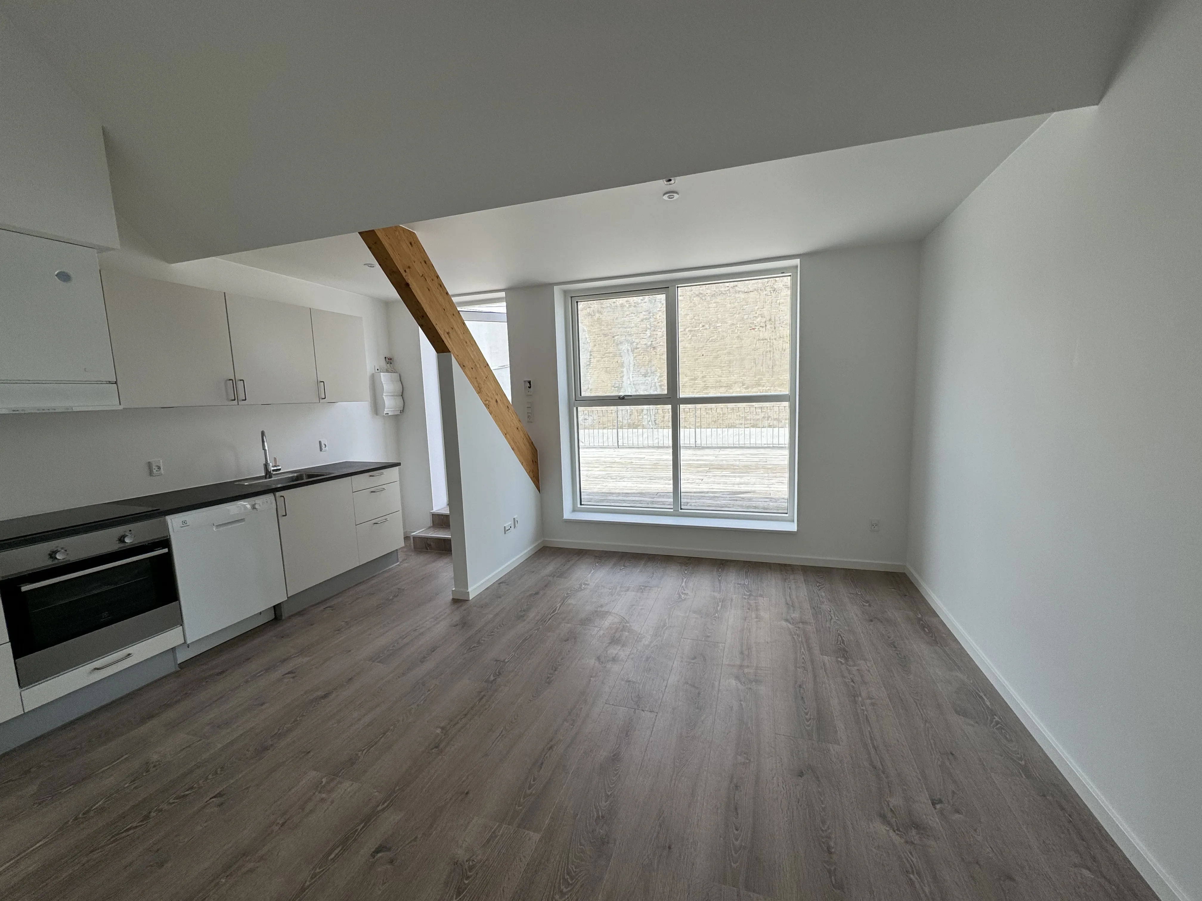 Unik 2-værelses lejlighed med 15 m² terrasse midt i Vejle centrum