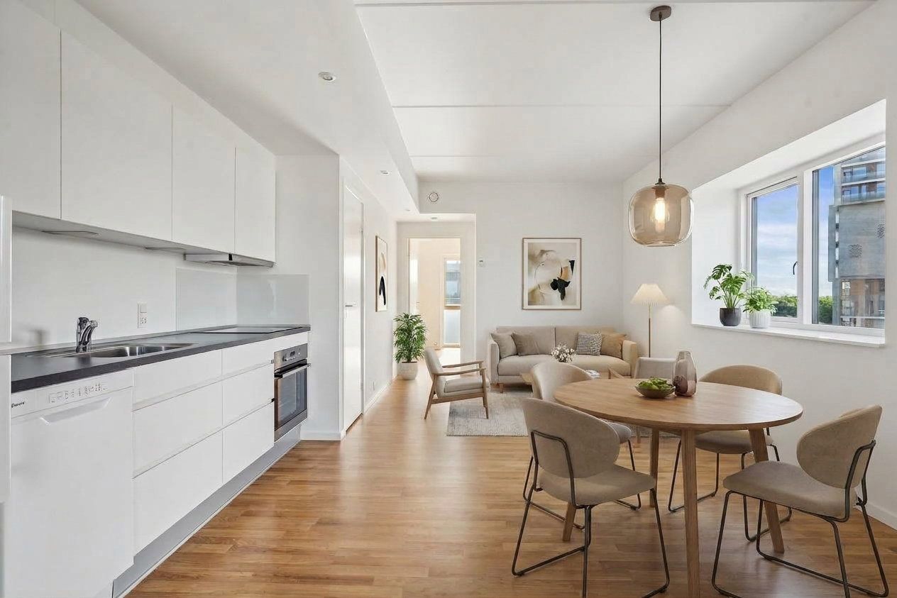 Lys 2-værelses på 62 m2 med fælles terrasse, elevator og parkering – seniorvenlig og rummelig