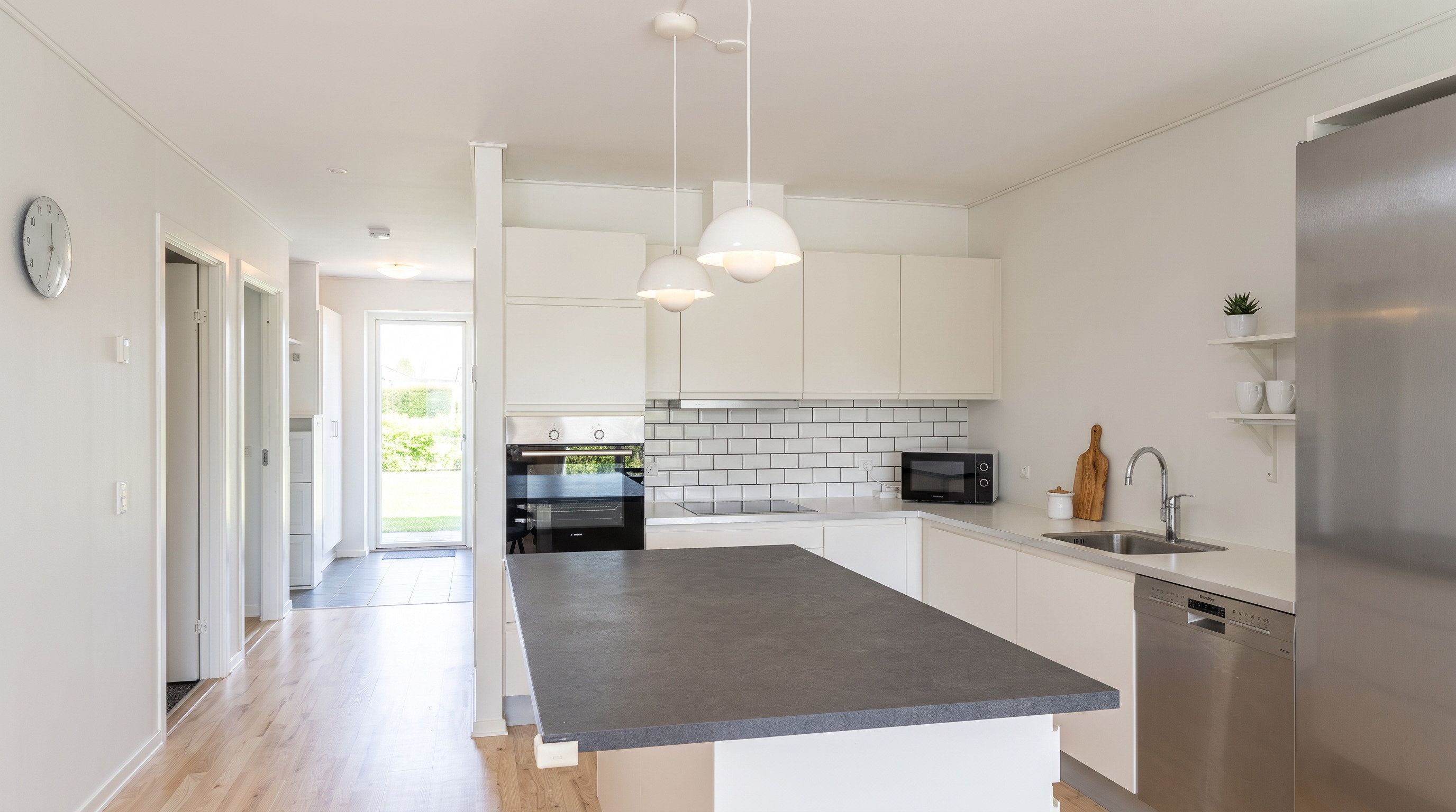 Rækkehus med stor terrasse og ideel beliggenhed – perfekt til familien eller som delebolig