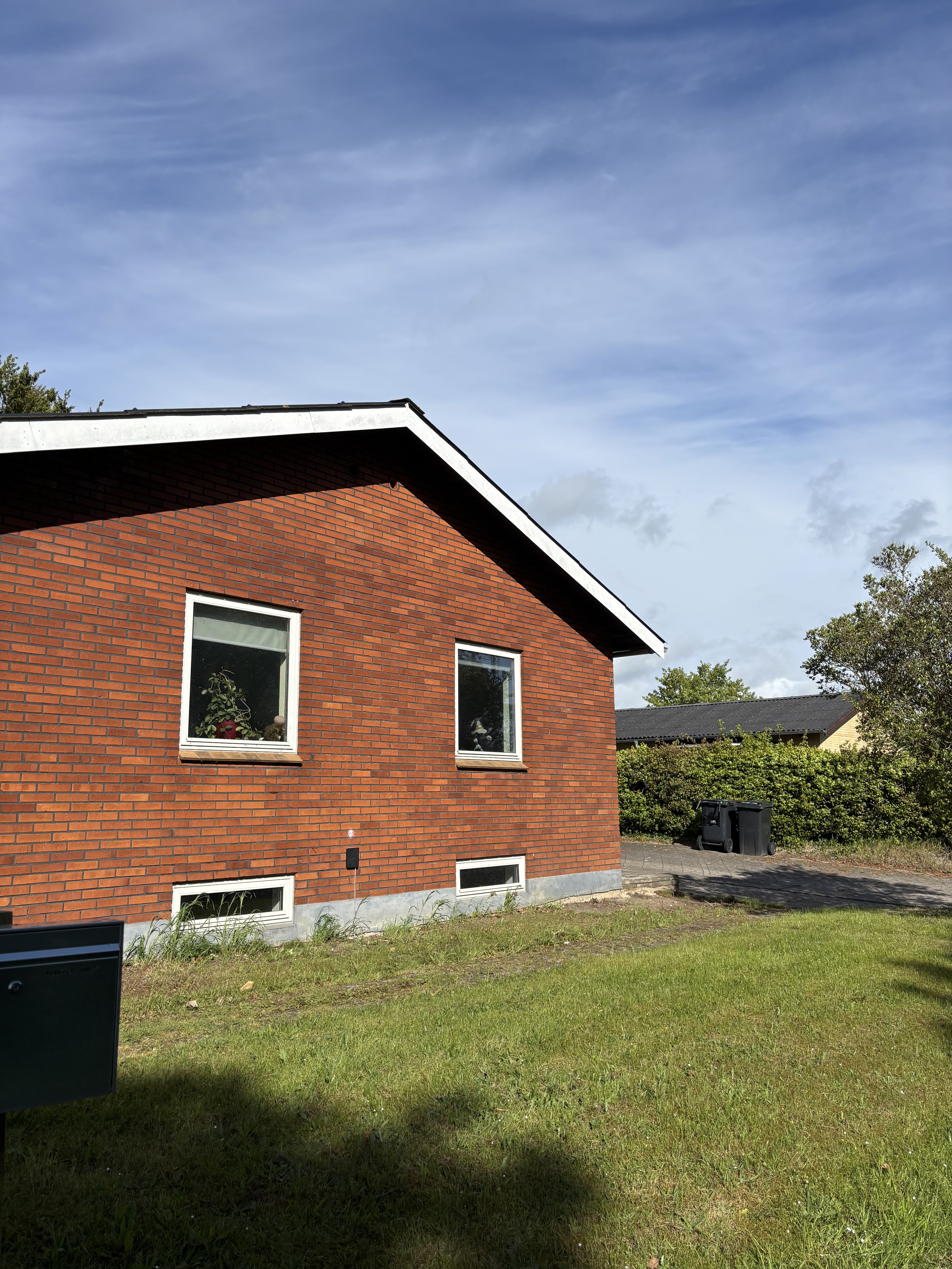 Skønt rækkehus med have centralt i Brovst