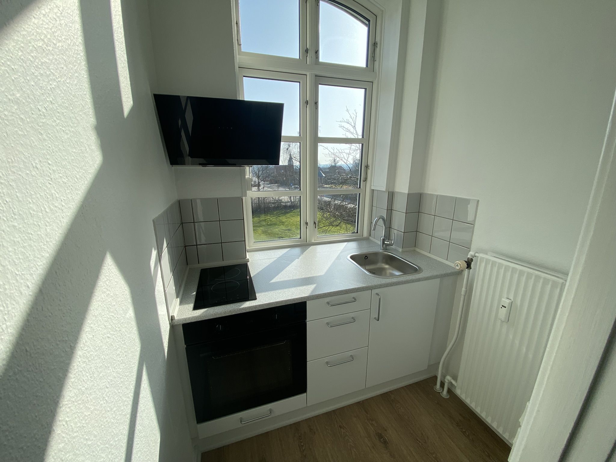 Hyggelig 1. sals lejlighed centralt i Christiansfeld 
