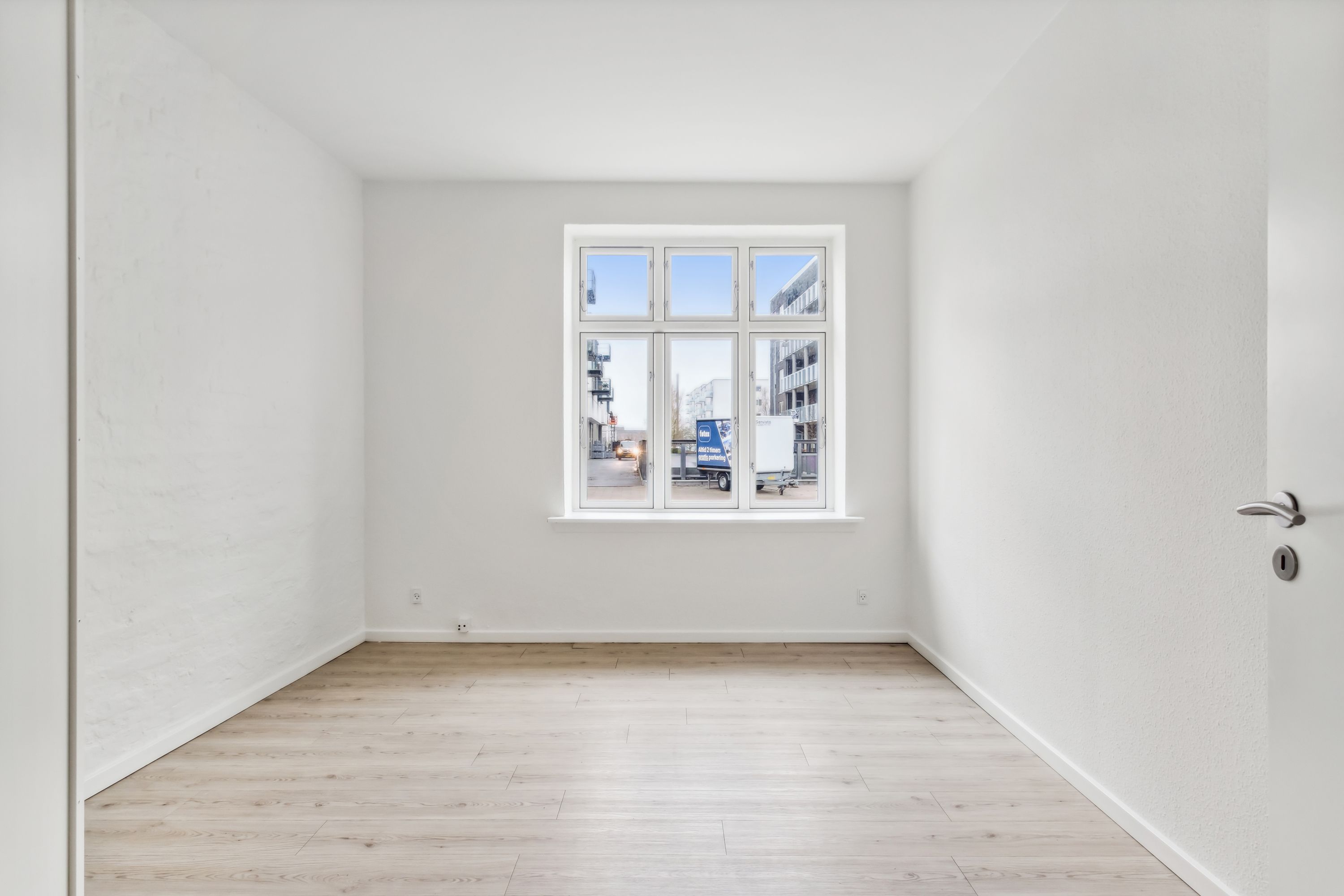 Rummelig 4-værelses lejlighed på 90 m² med direkte udgang til baggård