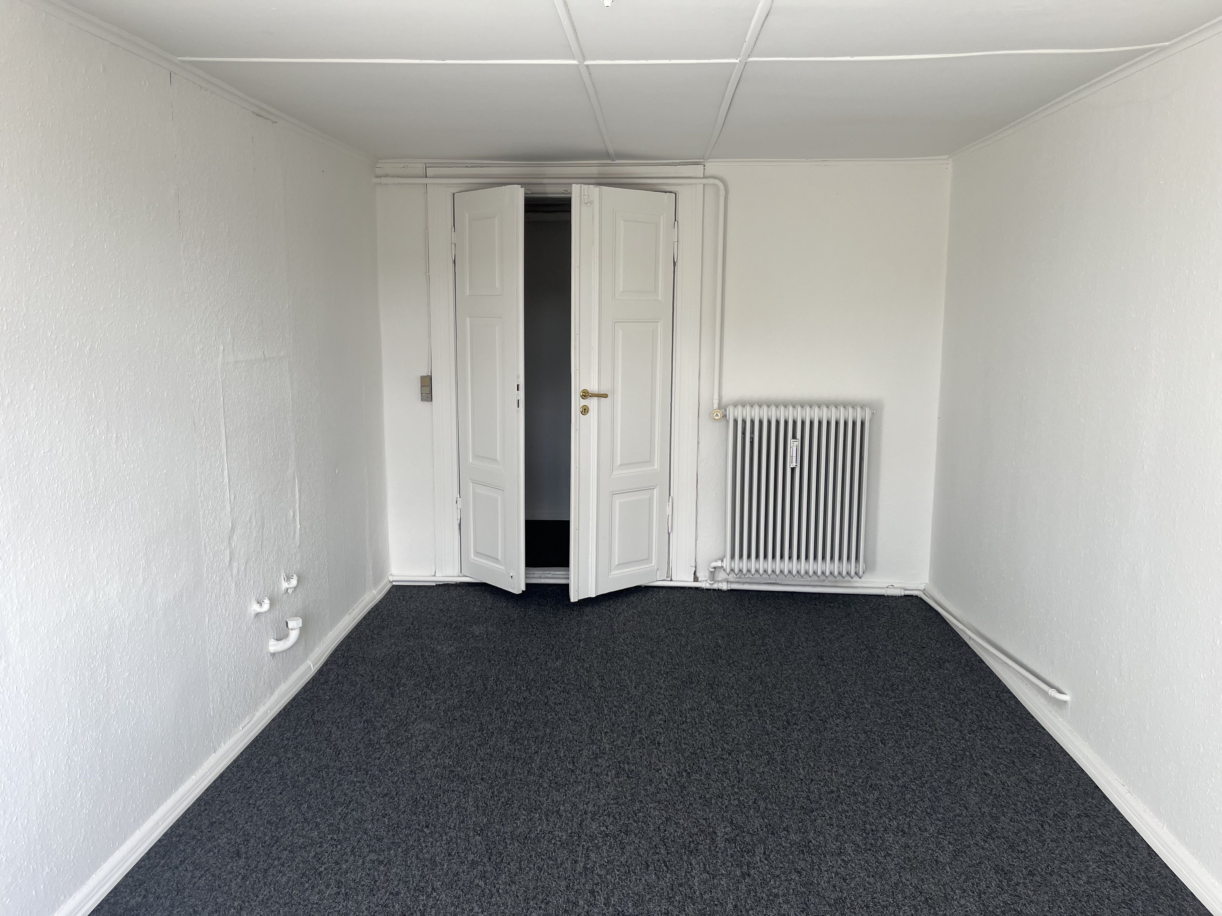 Stor lejlighed midt i Bredsten by