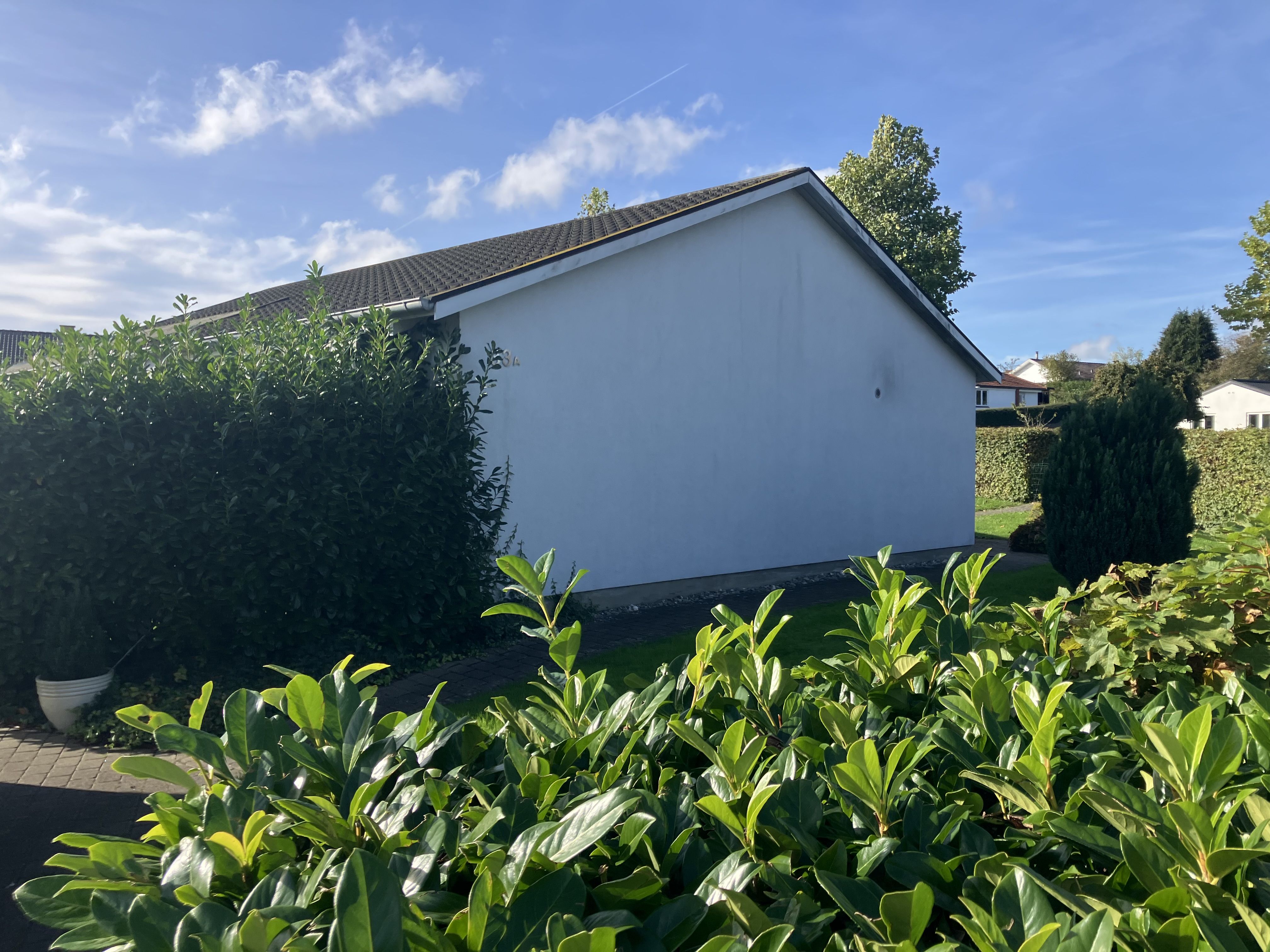 Dejligt enderække hus med have