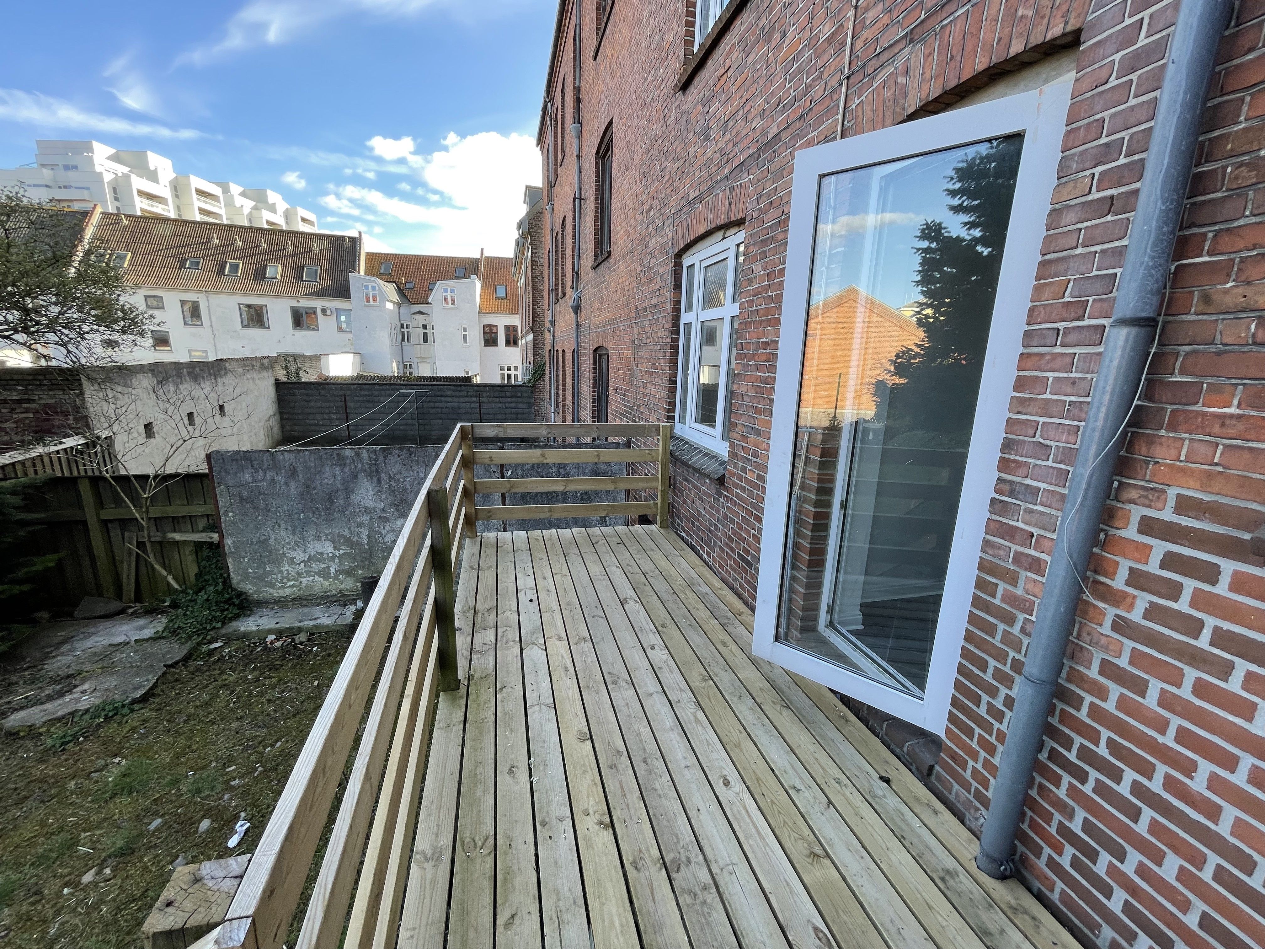 Hyggelig lejlighed midt i Horsens centrum med egen terrasse, tæt på havnen 