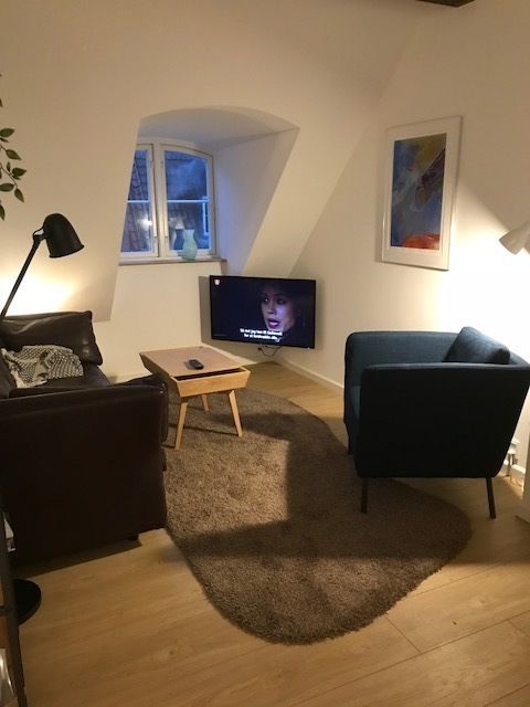 Møbleret, fuld udstyret pendlerlejlighed i hjertet af Middelfart (1. sals lejlighed)