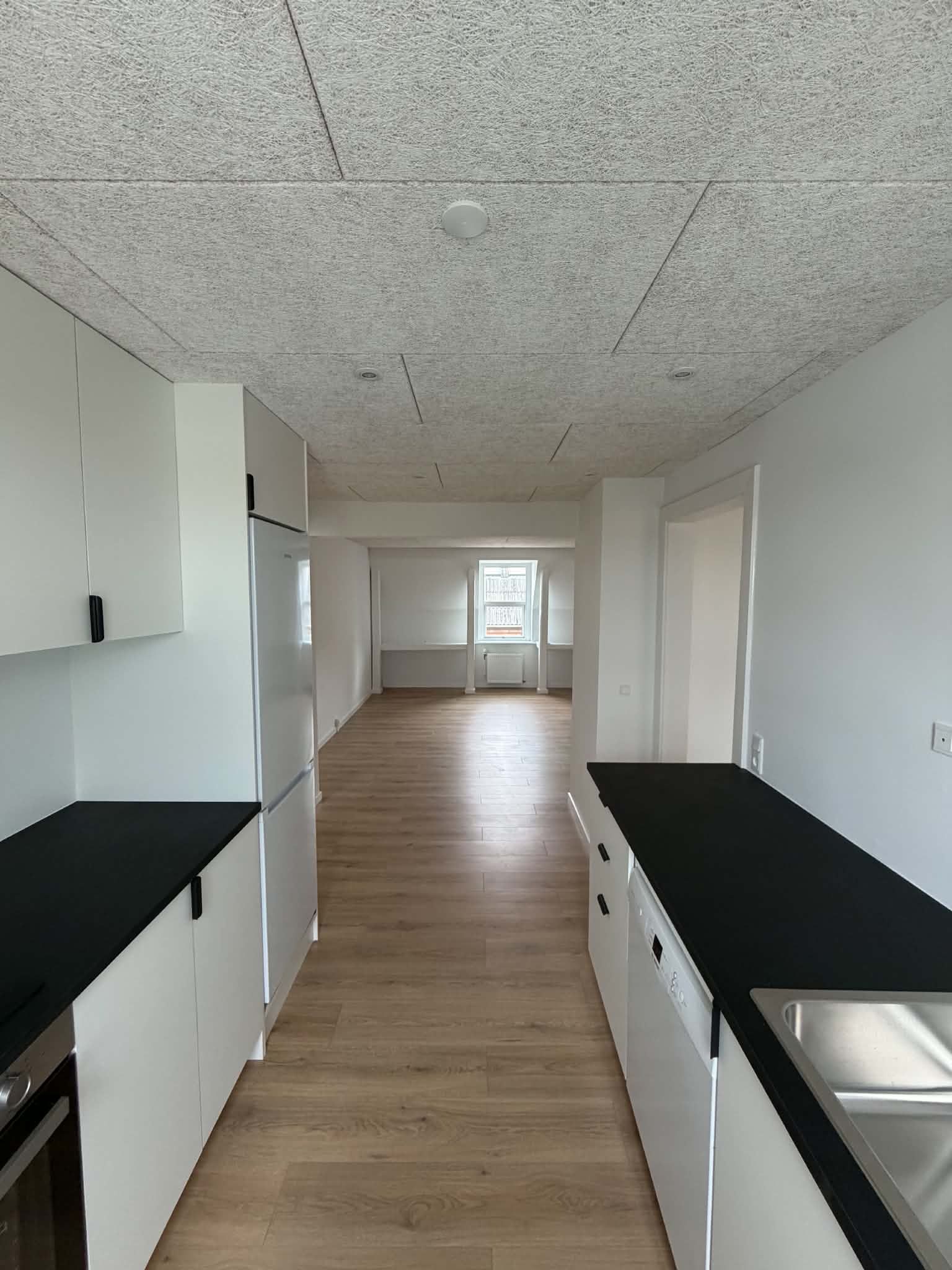 Nyrenoveret og centralt beliggende 4-værelses lejlighed på 113 m²