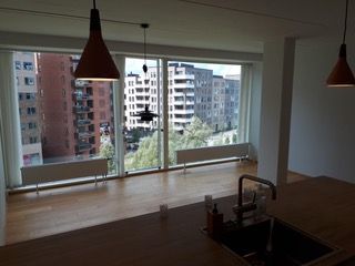 Lys lejlighed i prisvindende 8-tallet med altan og udsigt over Amager Fælled