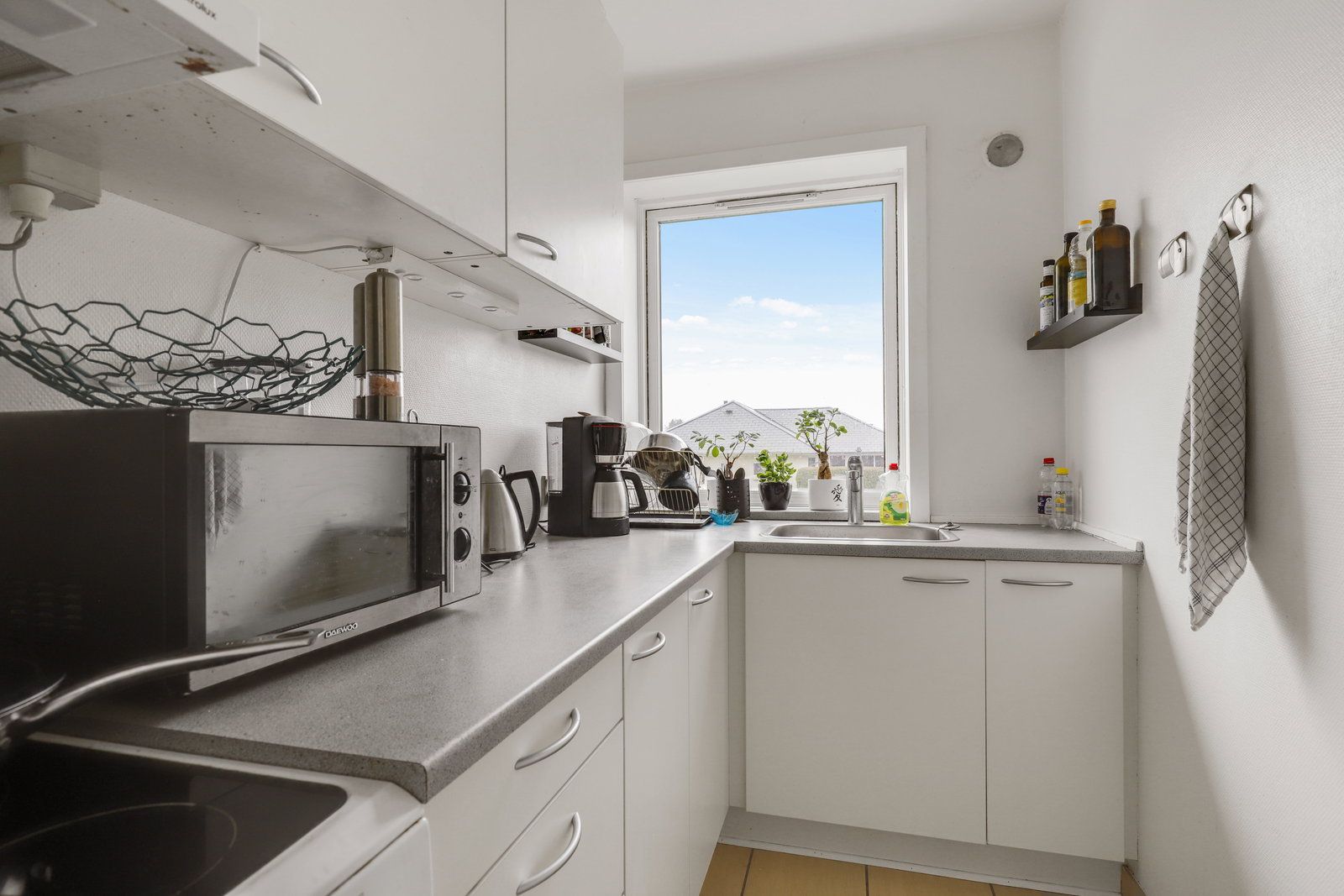 Lys 2-værelses med altan og fælles have – 50 m2