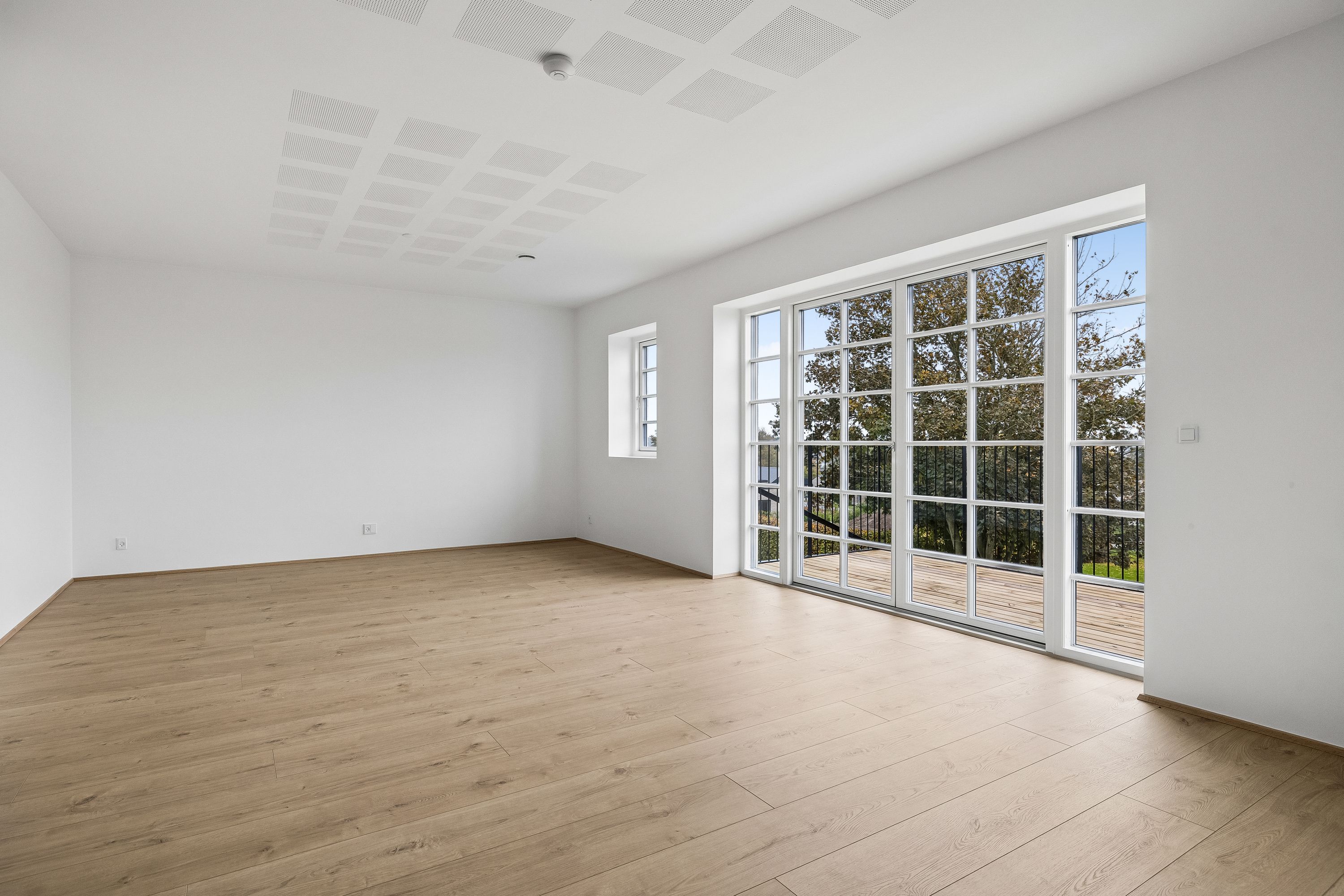 Nyopført lejlighed på 107 m² i Årslev med sydvendt altan, flot udsigt og to badeværelser
