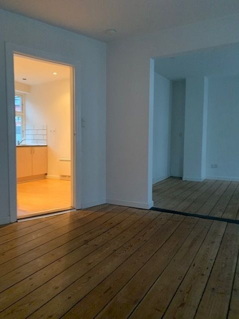 Lækker 2v. lejlighed i 2 plan i centrum.