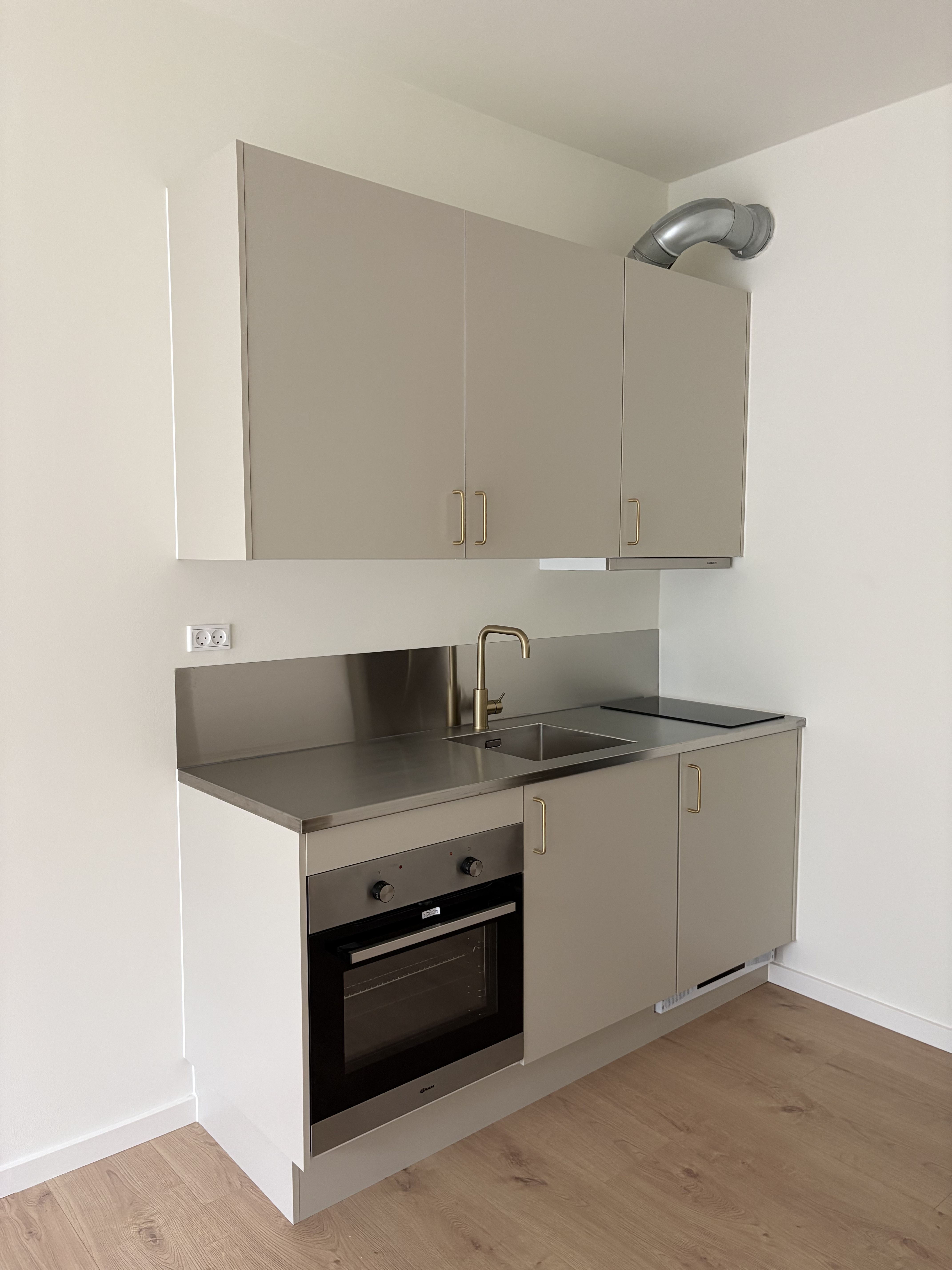 Stuelejlighed med disponibelt rum og privat terrasse