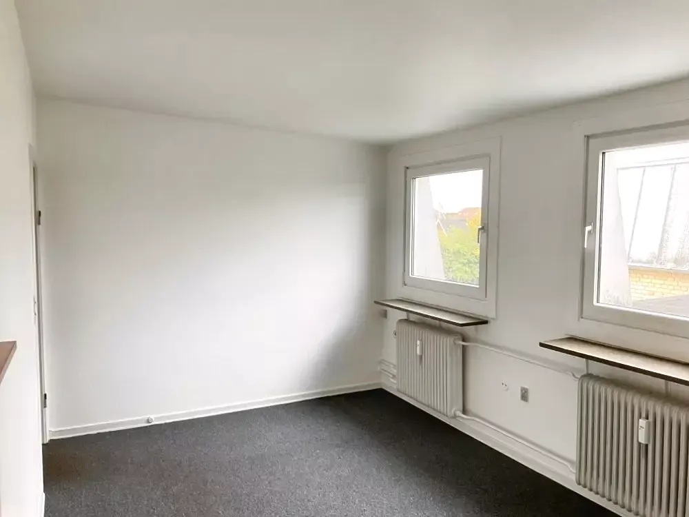 Lys 2-værelses på 44 m2 med indbyggede skabe og parkering