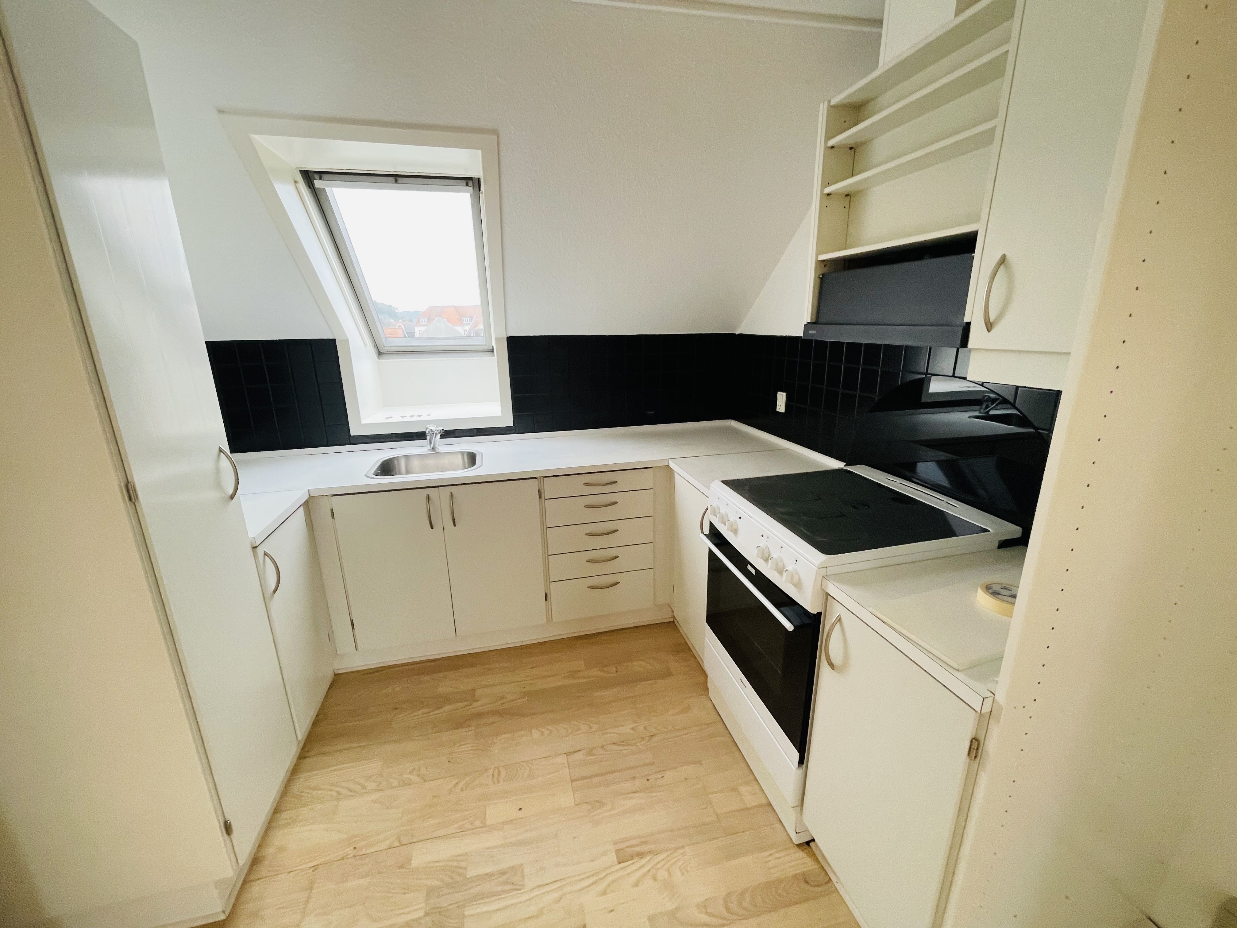 Penthouse i Torvegade med udsigt til havnen
