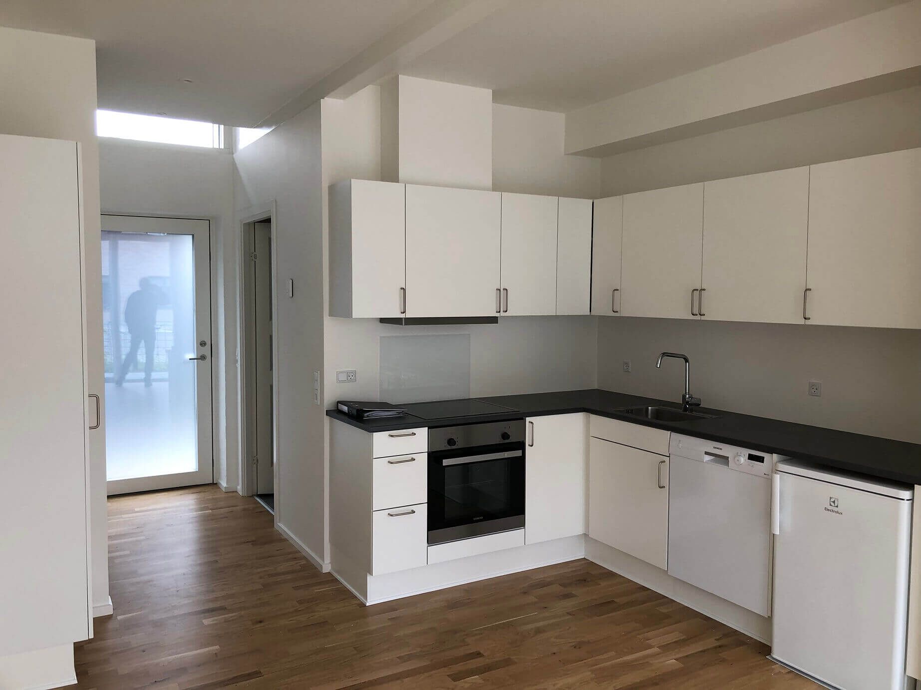 Nyopført 1-værelses lejlighed med privat terrasse!