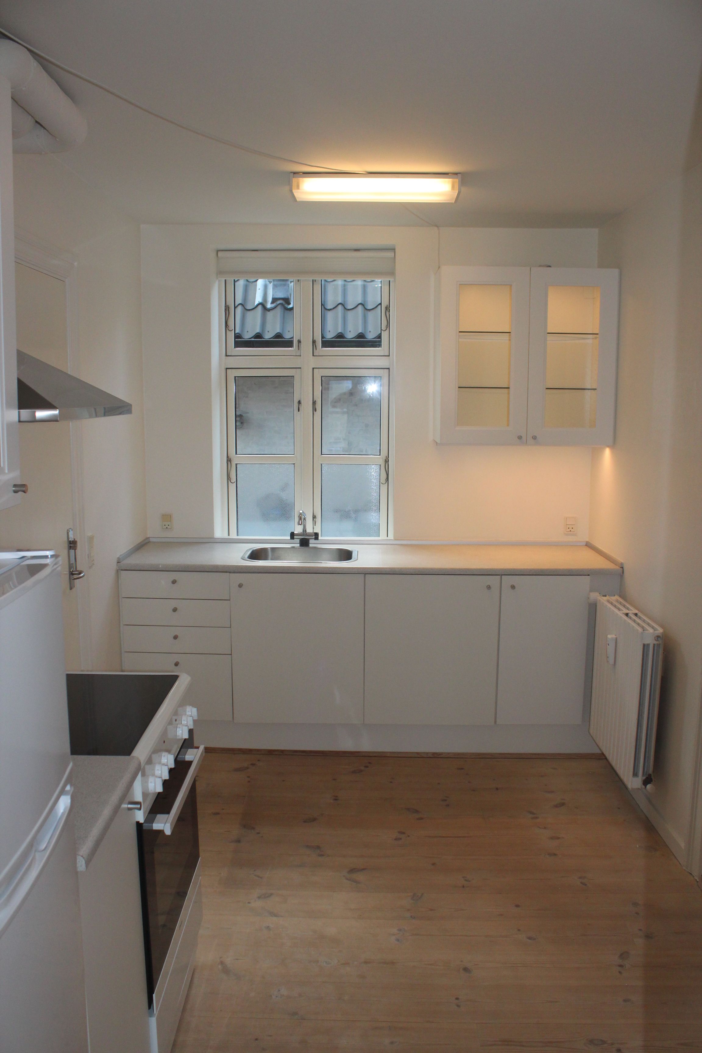 Hyggelig lejlighed med stor fælles have, photo 1