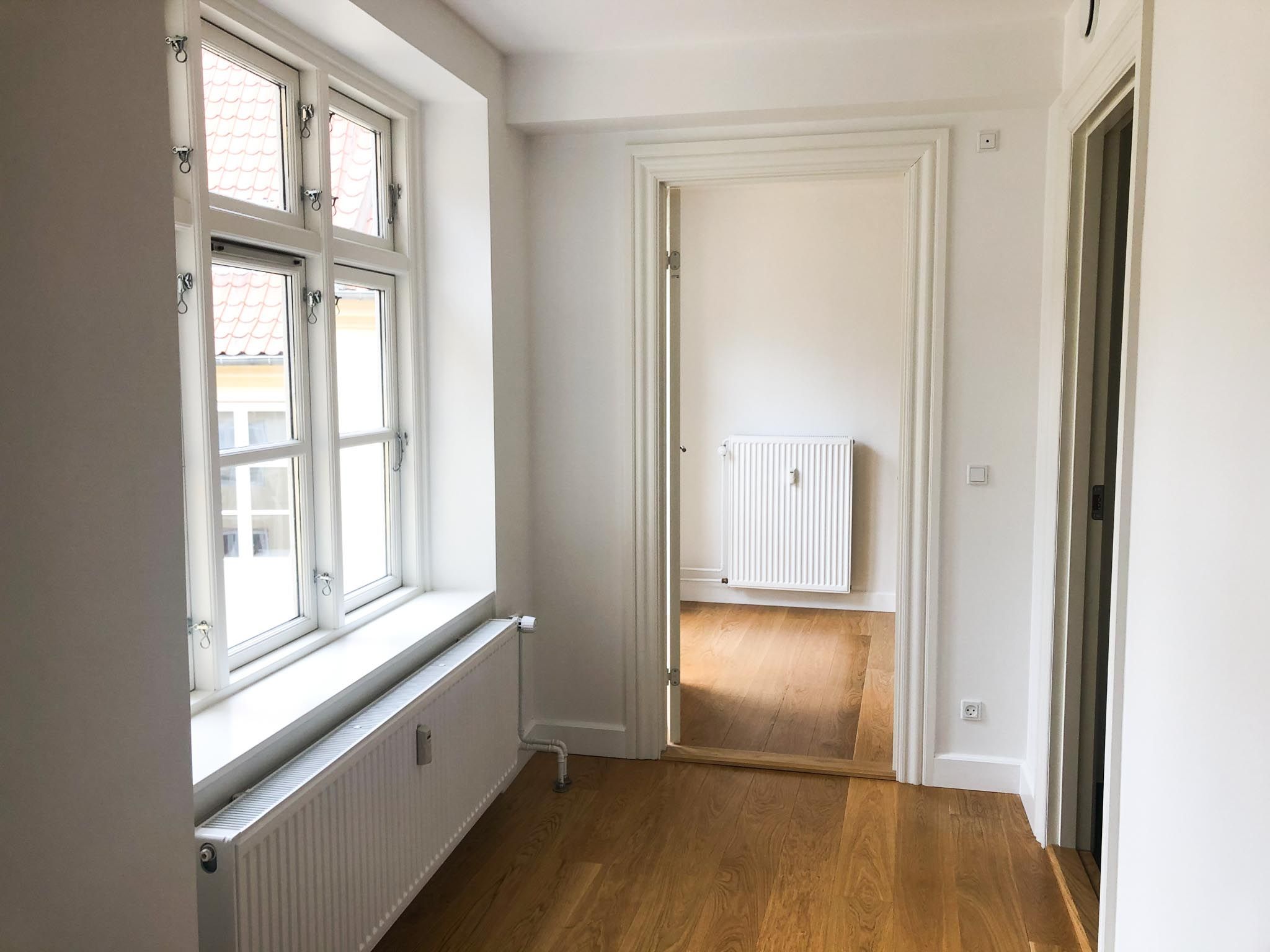 City-lejlighed på Strøget med fransk altan mod gården 