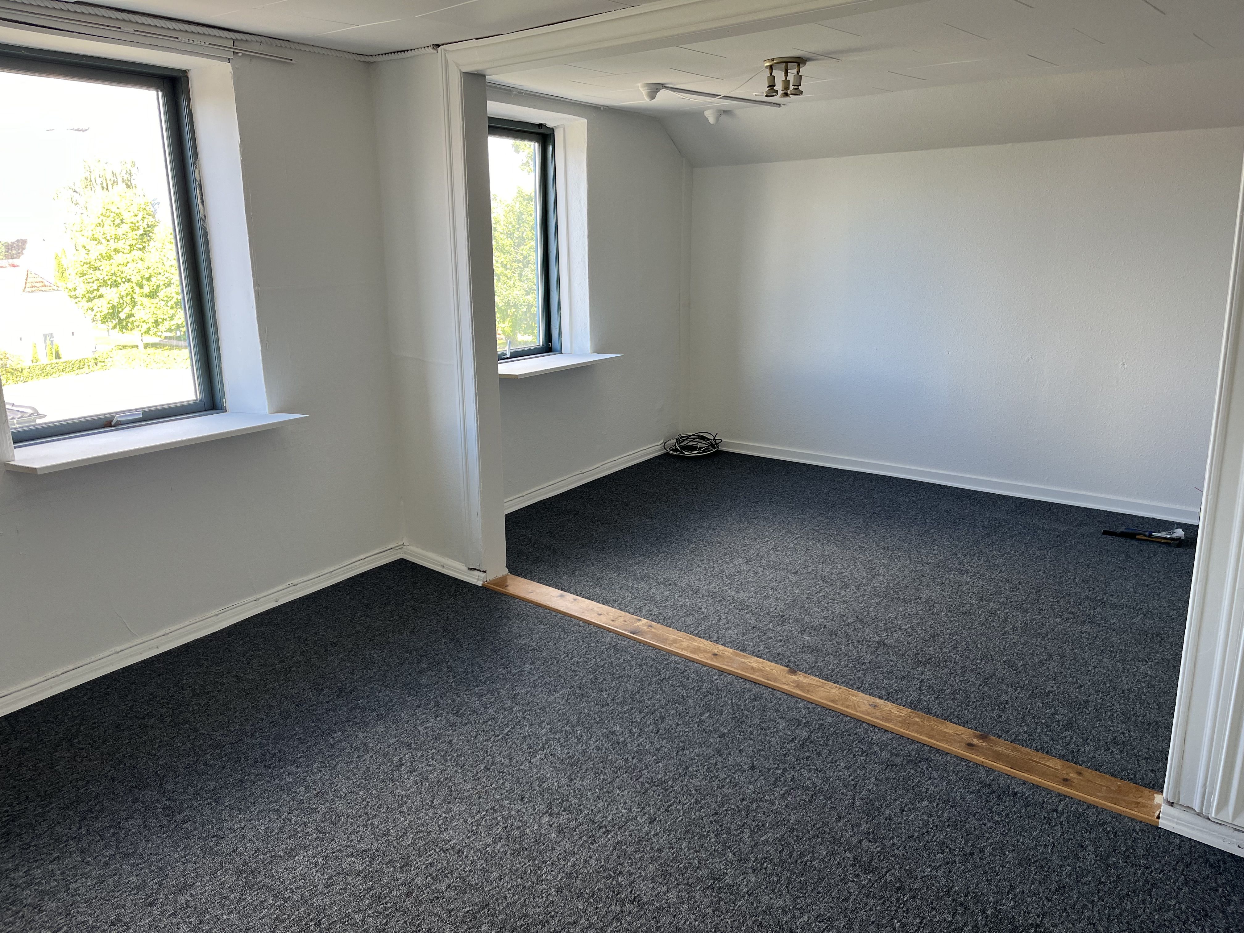 Stor lejlighed midt i Bredsten by