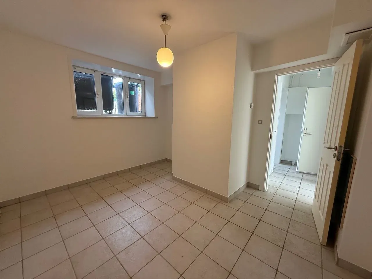 Fin kælderlejlighed på 60 m²