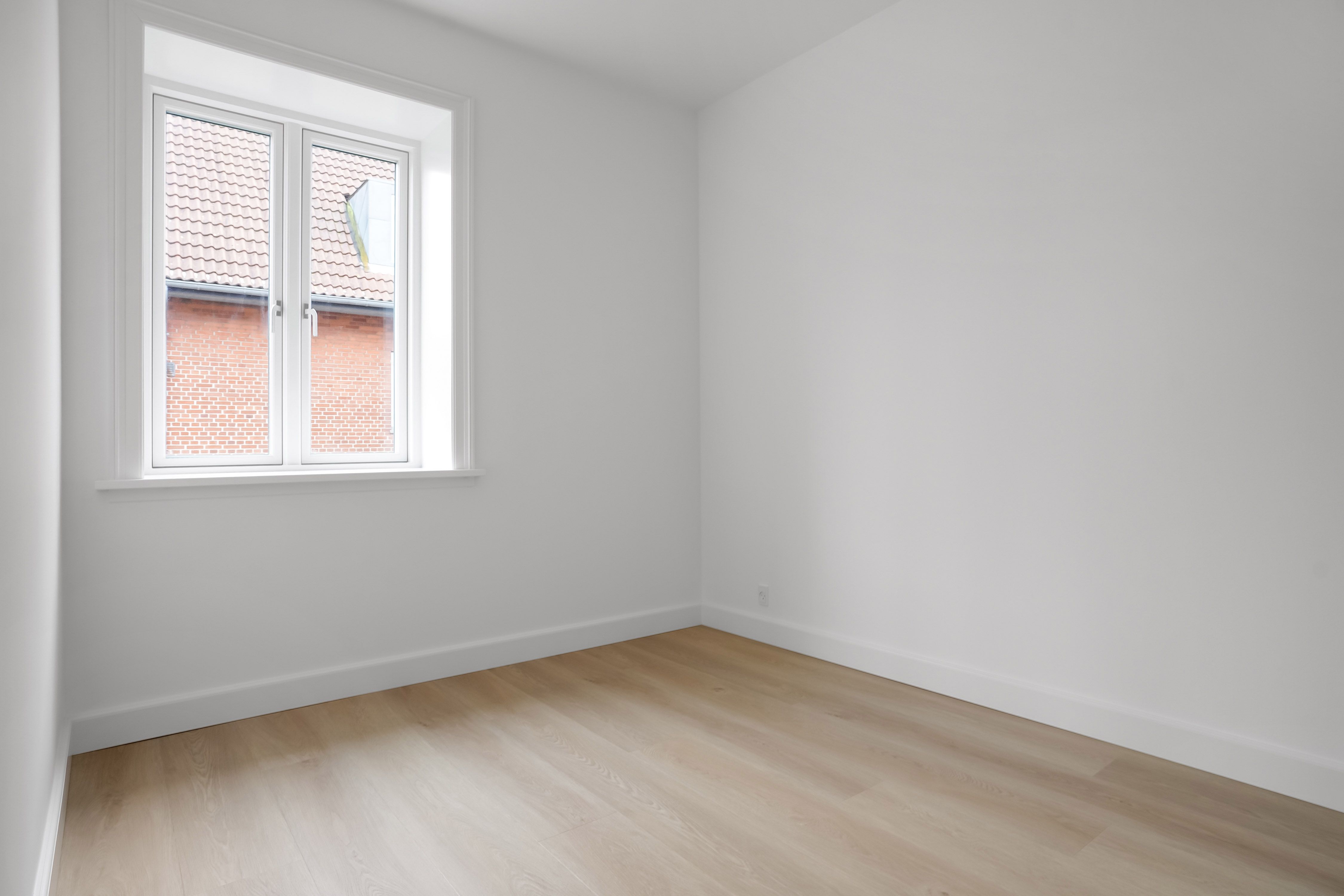 Nyopført 2-værelses lejlighed på 64 m² med terrasse.
