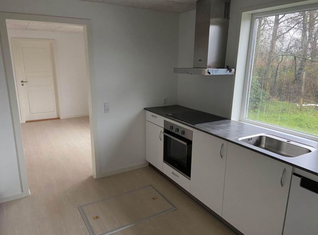 Nyrenoveret lejlighed med luft til vand varmepumpe 