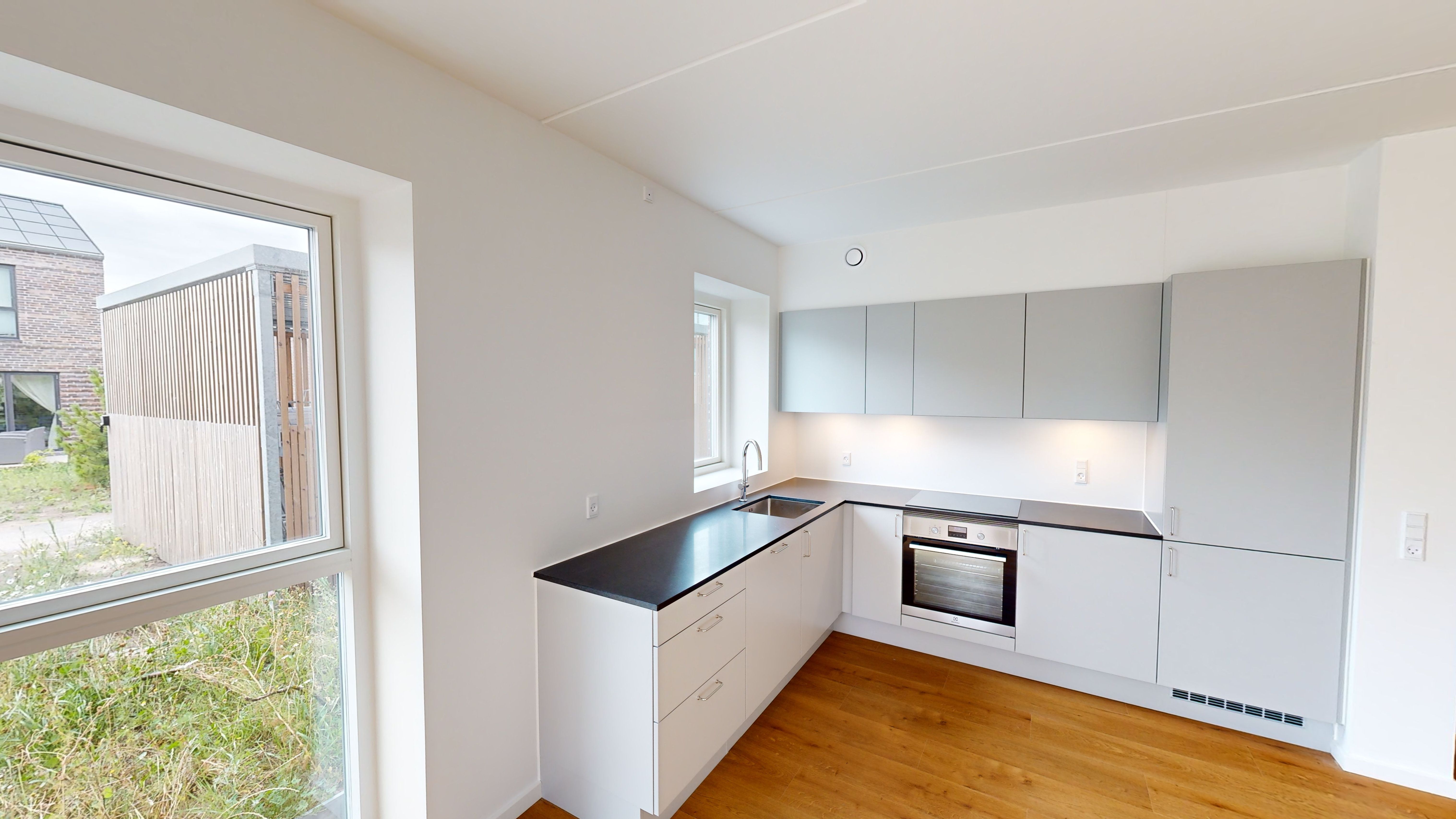 Skøn lejlighed + fælleshus med boldspilssal, fitness, lounge, tagterrasse m.v.