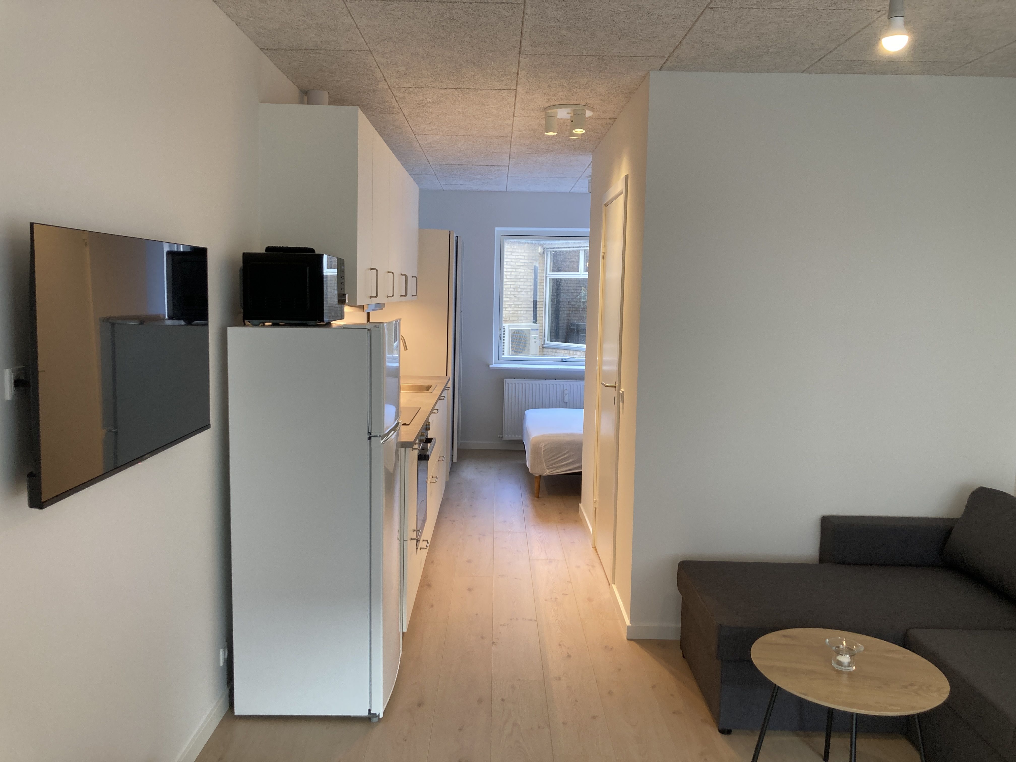 Lys funktionel lejlighed i centrum