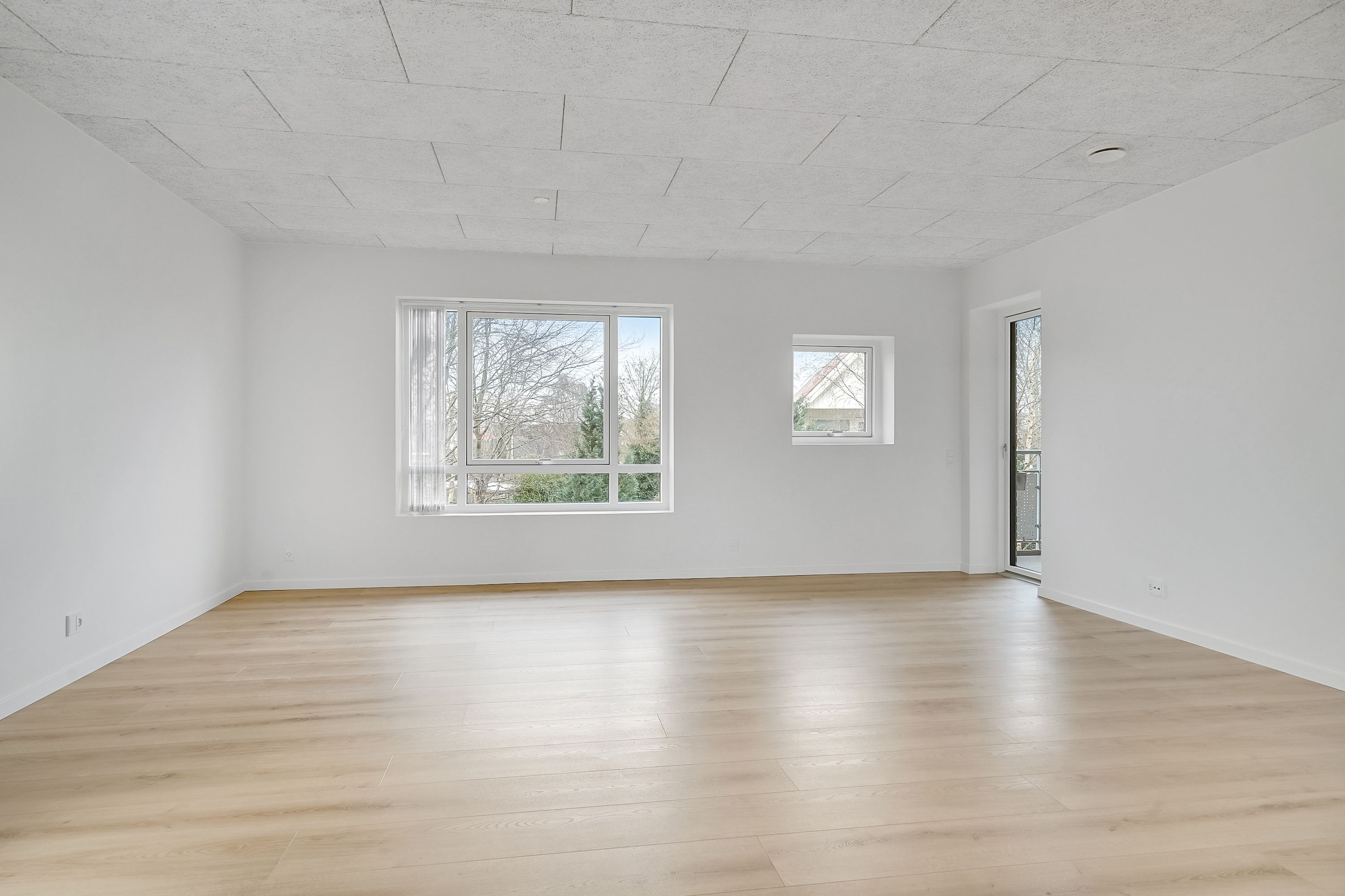 Lys og veldisponeret 3-værelses lejlighed på 96 m² med altan