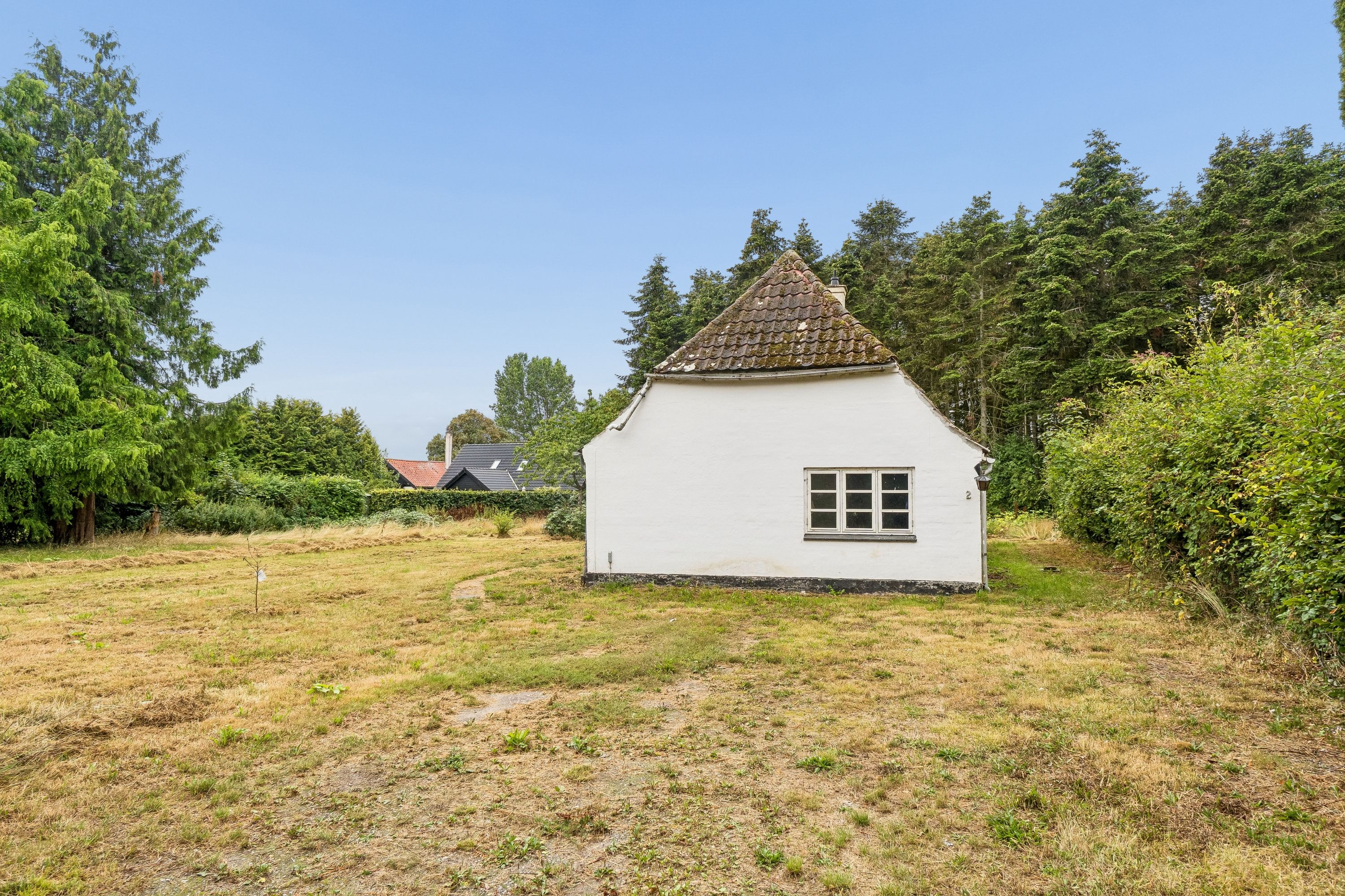 Skønt beliggende hus på dobbeltgrund op til skov