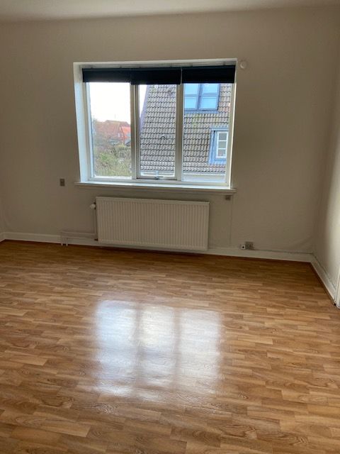 Lyst sammenhængende værelse i Odense Centrum.