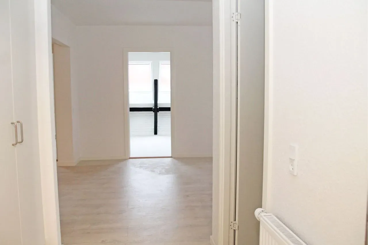 129 m² super fin lejlighed midt i gågaden med altan og elevator