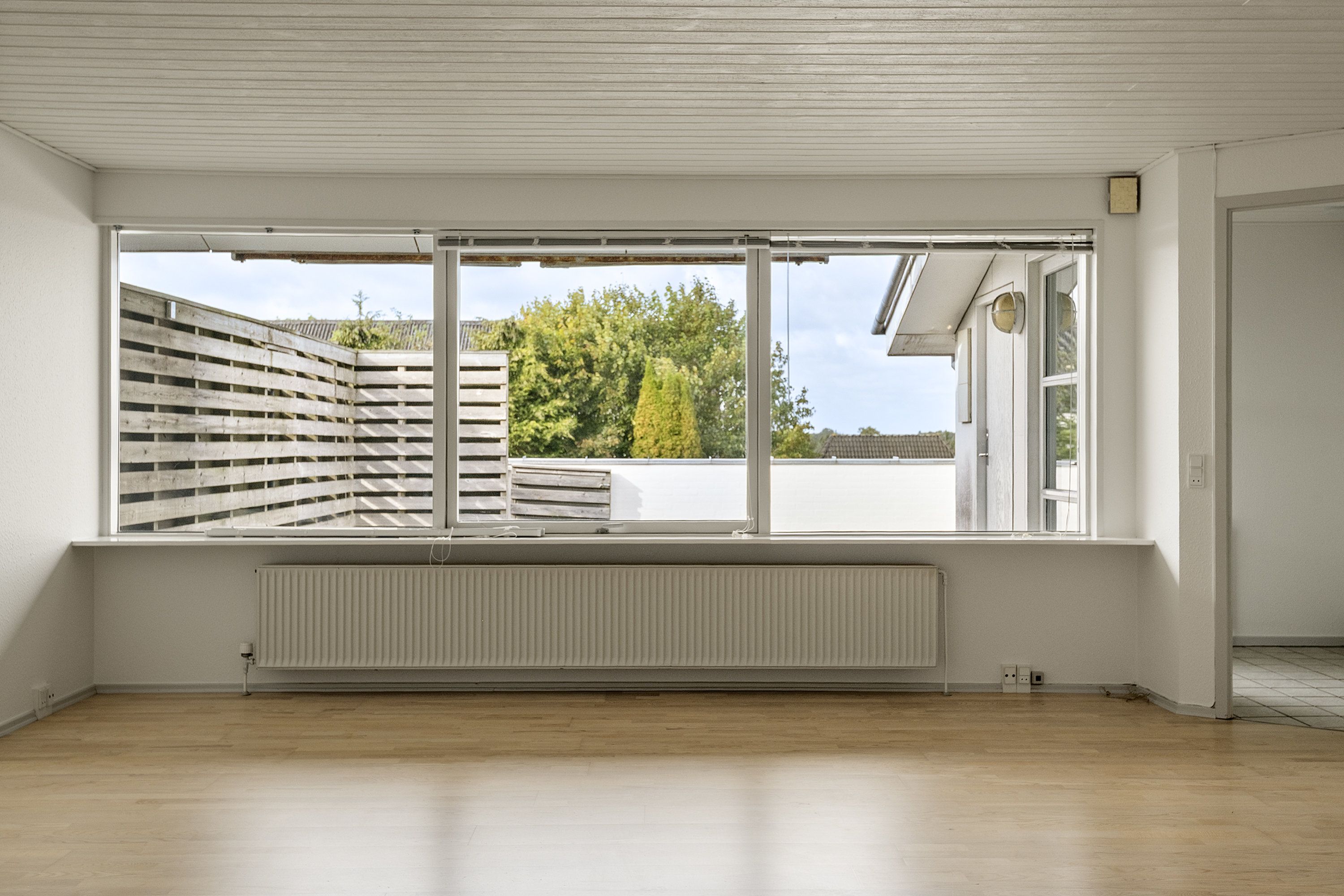 Lys og rummelig lejlighed med stor terrasse