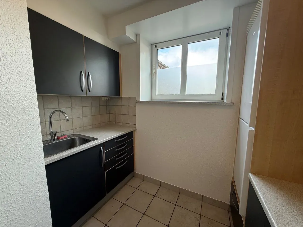 Fin kælderlejlighed på 60 m²