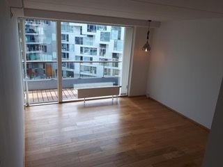 Lys lejlighed i prisvindende 8-tallet med altan og udsigt over Amager Fælled
