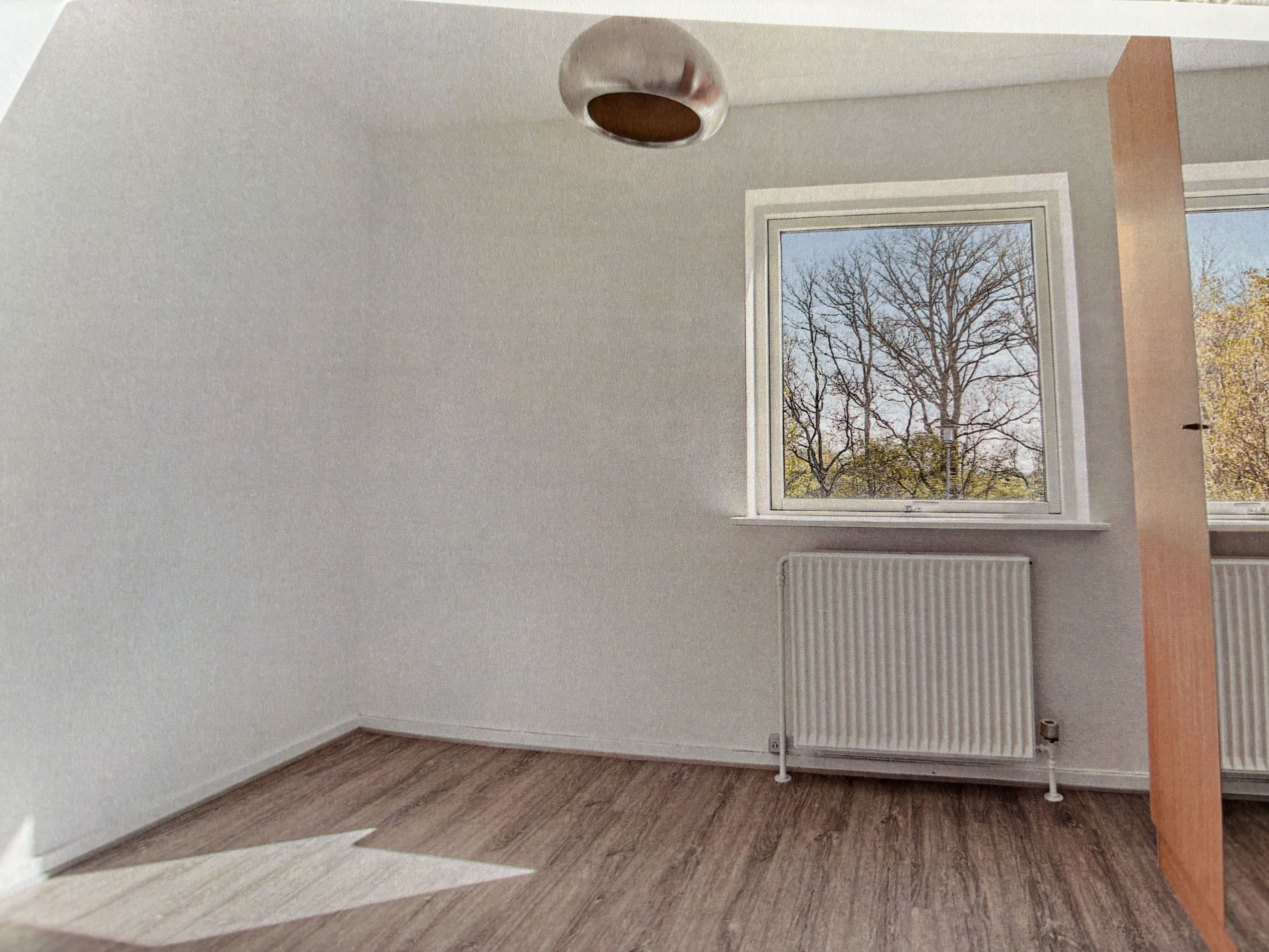 Skønt rækkehus med have centralt i Brovst