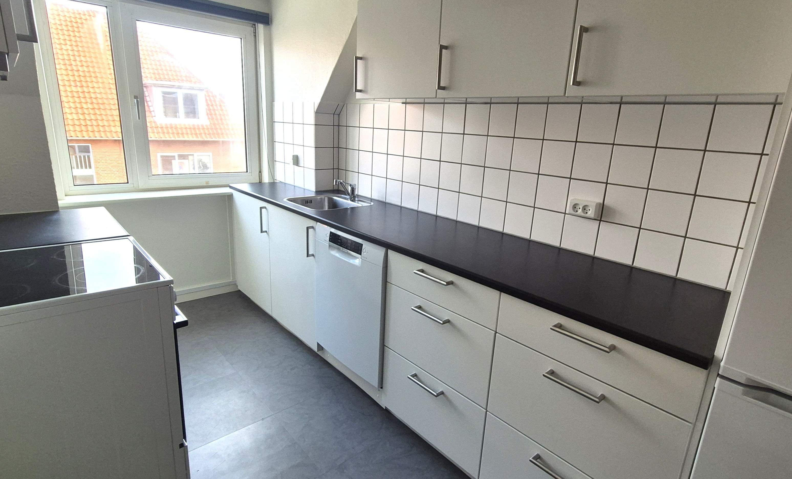 Taglejlighed med stor stue