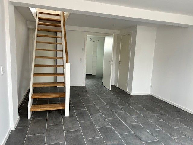 Moderne byhus i historisk bygning