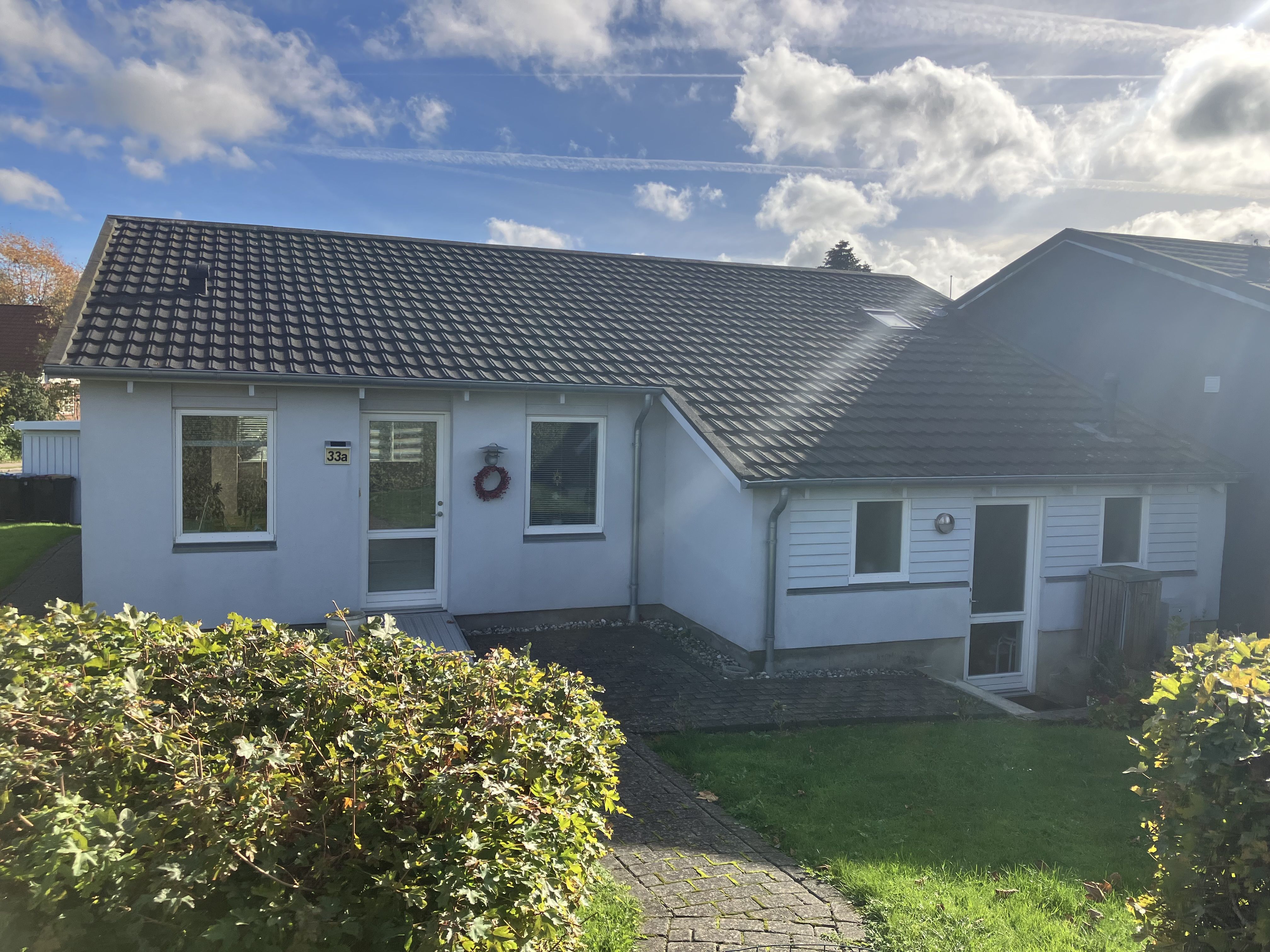 Dejligt enderække hus med have