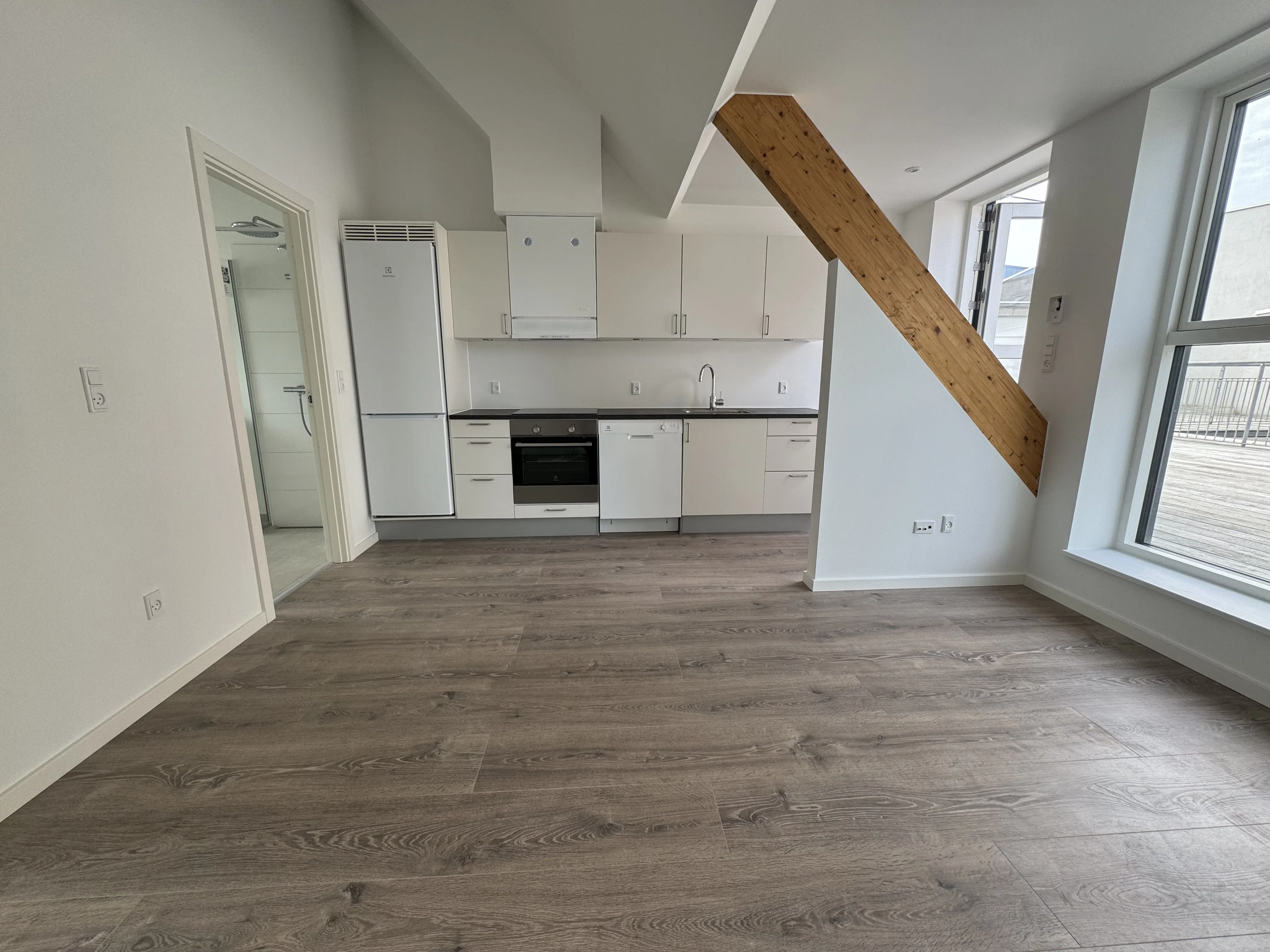 Unik 2-værelses lejlighed med 15 m² terrasse midt i Vejle centrum